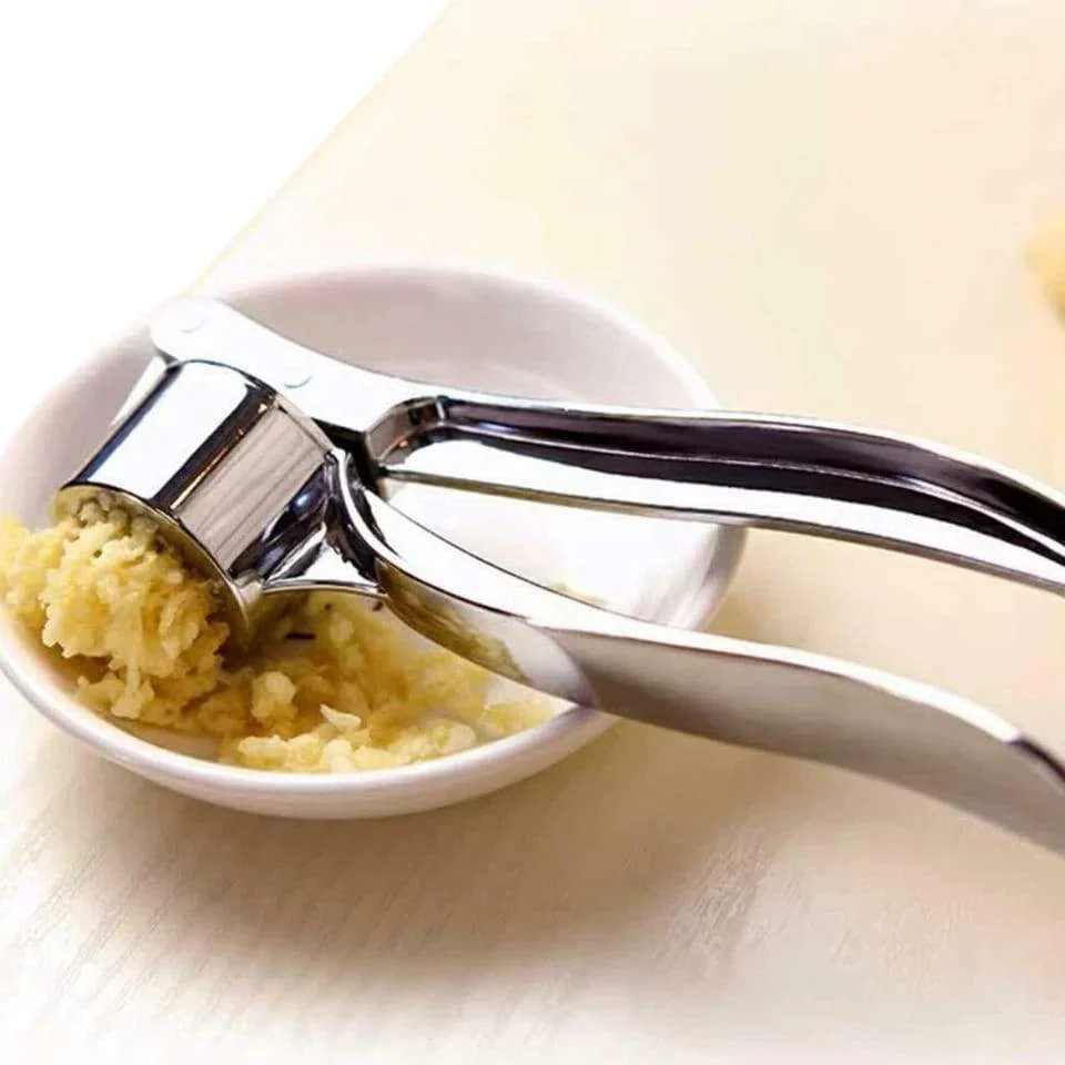 Stainless Steel Garlic Press Crusher ,Crusher ,Squeezer ,Masher ,and Lemon Juicer - Image 3