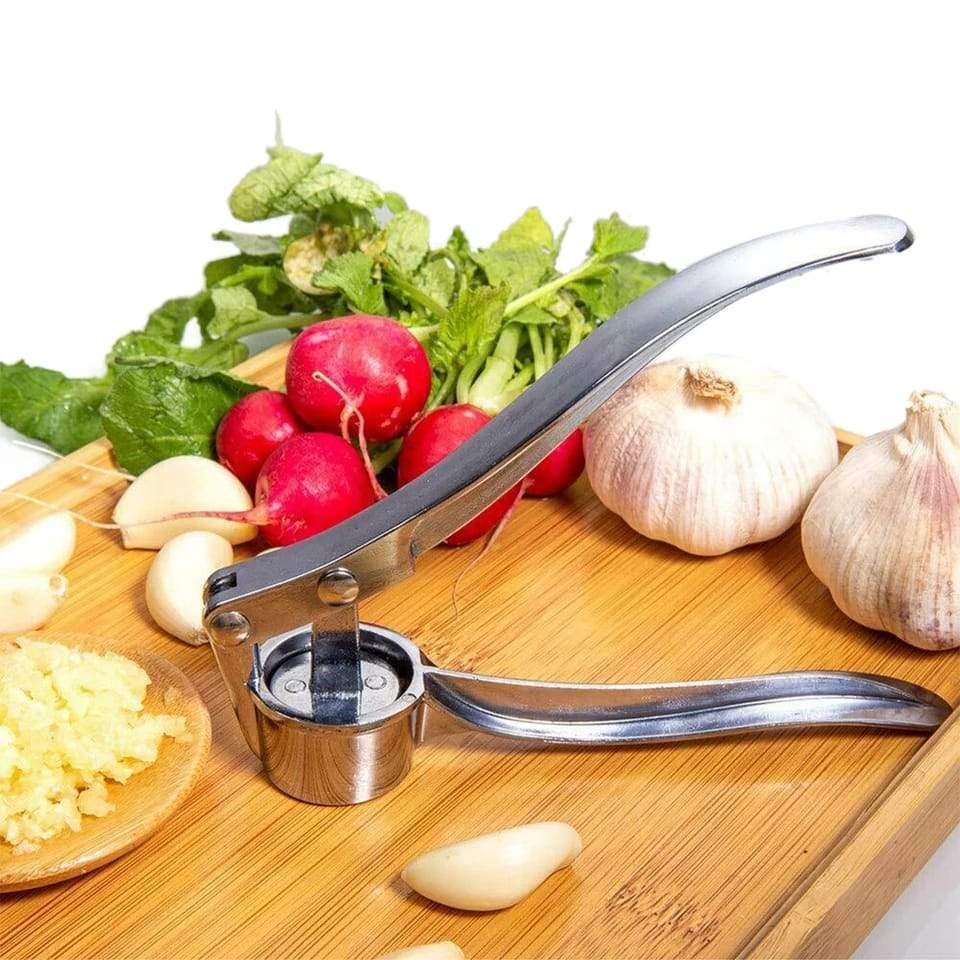 Stainless Steel Garlic Press Crusher ,Crusher ,Squeezer ,Masher ,and Lemon Juicer - Image 6