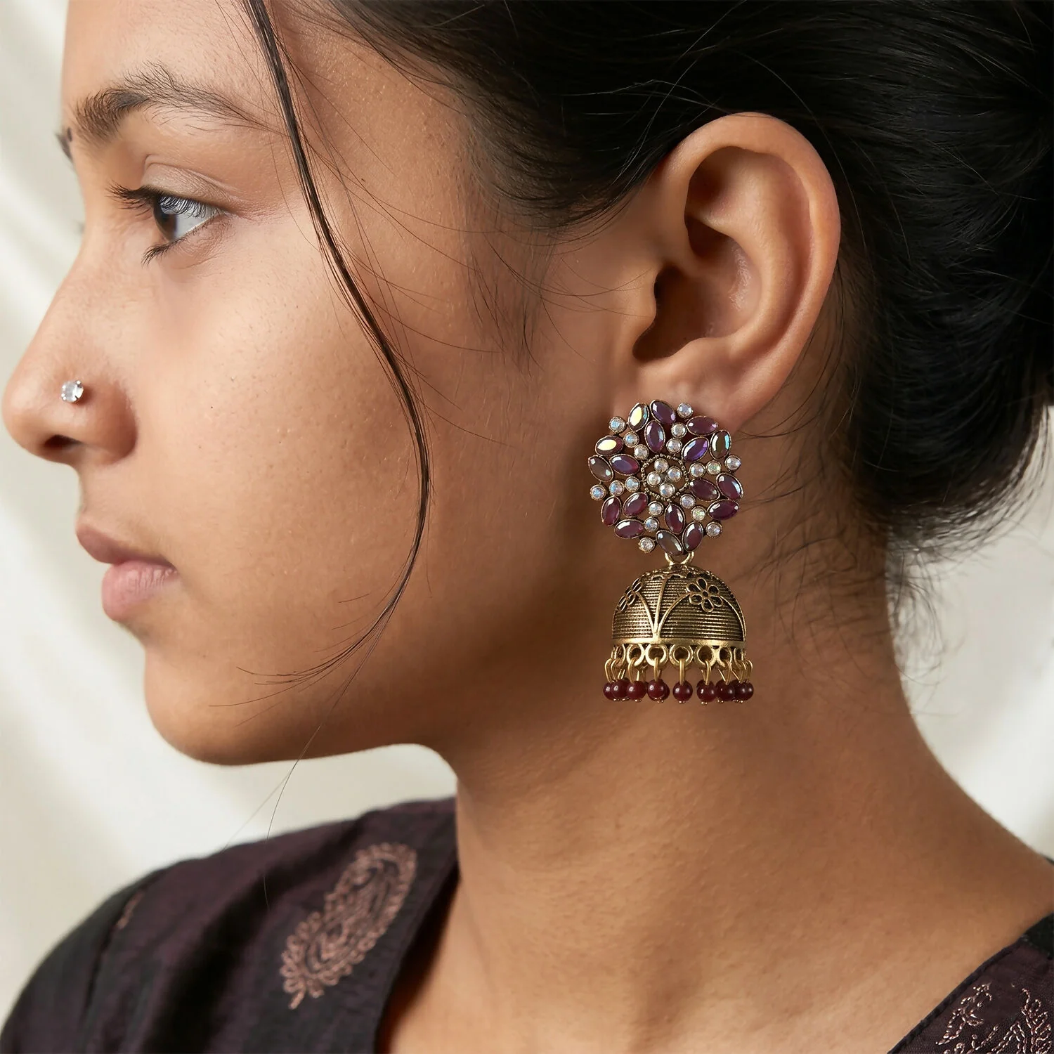Antique Golden Jhumka Earrings with Maroon Stone Floral Top - Image 4