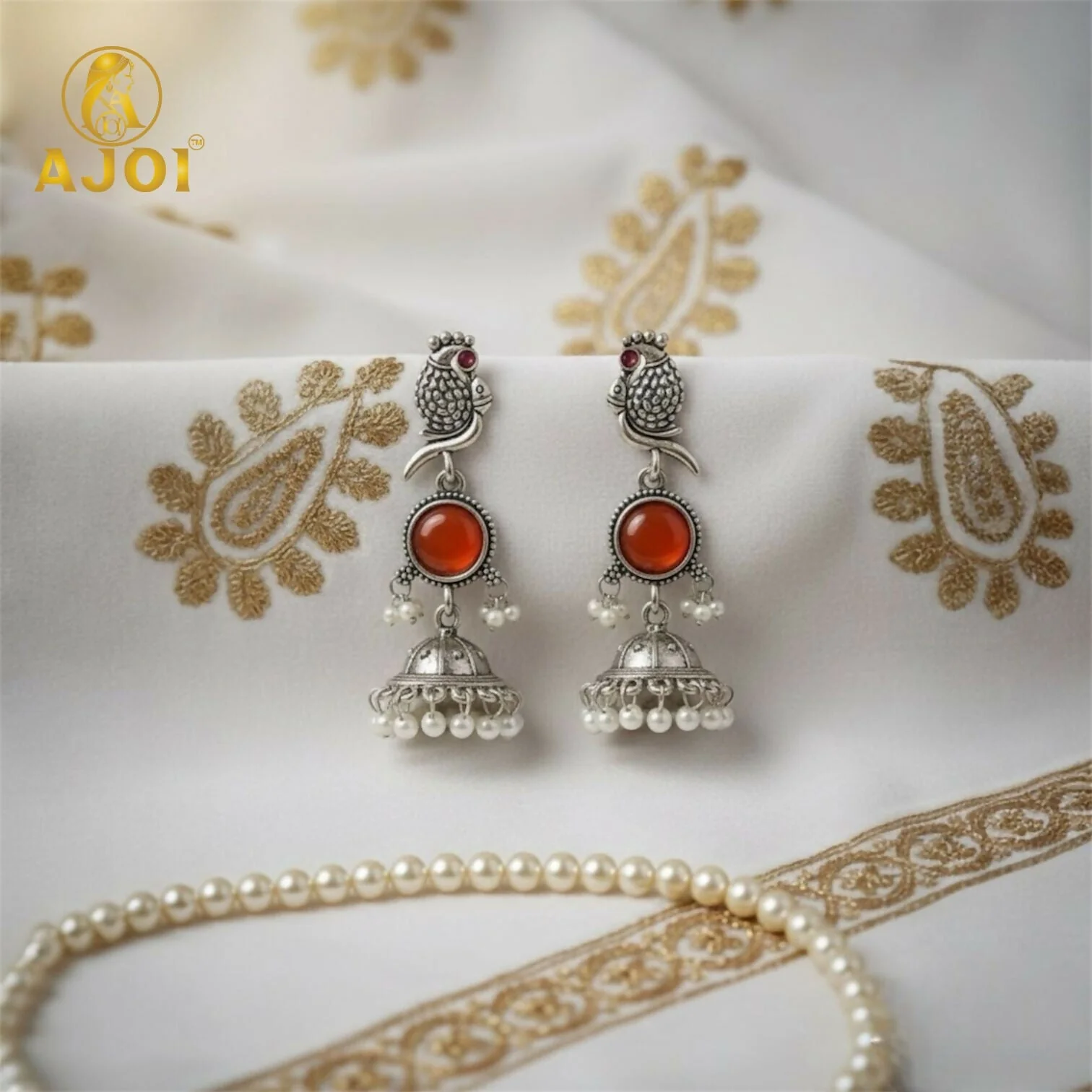 Antique Silver Peacock Jhumka Earrings with Red Stone Centerpiece & Pearl Drops - Image 3
