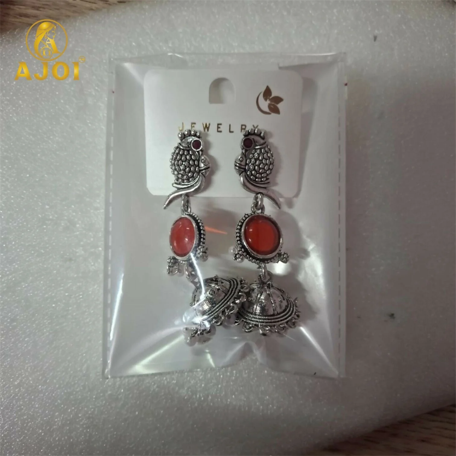 Antique Silver Peacock Jhumka Earrings with Red Stone Centerpiece & Pearl Drops - Image 5