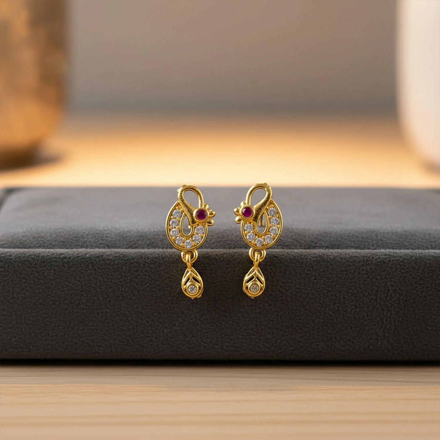 Classic Gold Finish Earrings with Crystal Detailing & Red Stone - Image 2