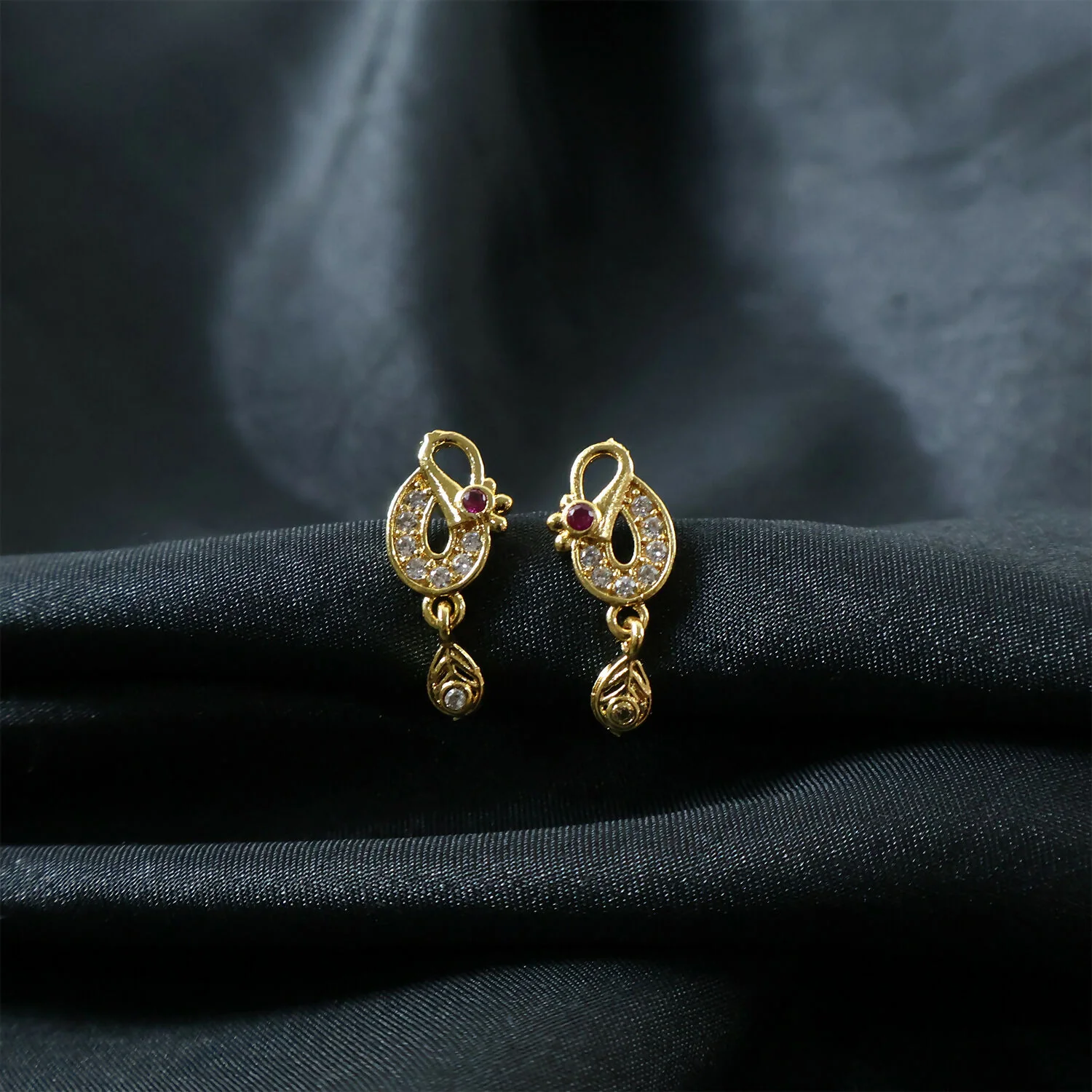 Classic Gold Finish Earrings with Crystal Detailing & Red Stone - Image 3