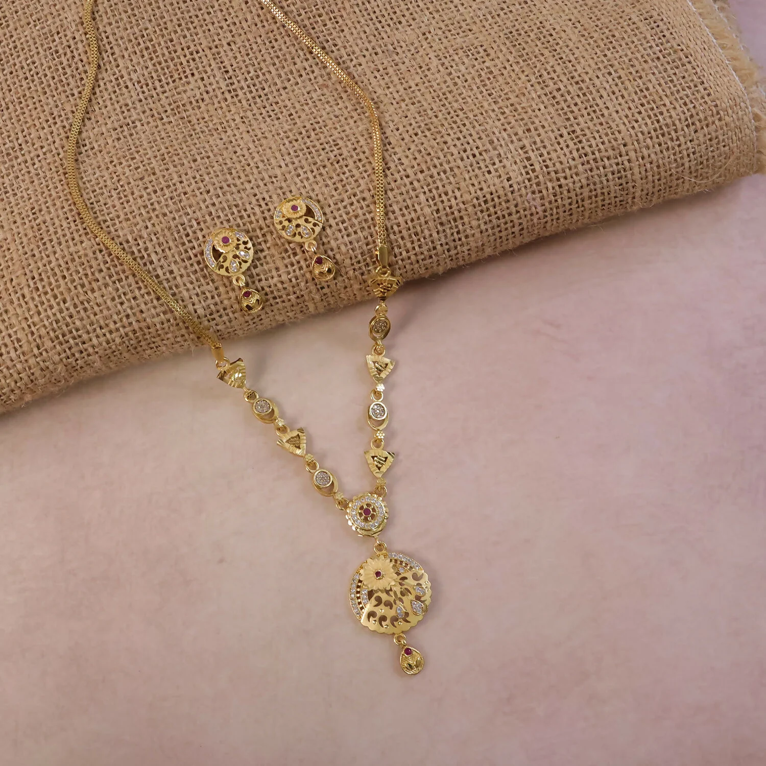 Classic Gold-Tone Floral Engraved Pendant Necklace Set with Designer Stud Earrings - Image 2