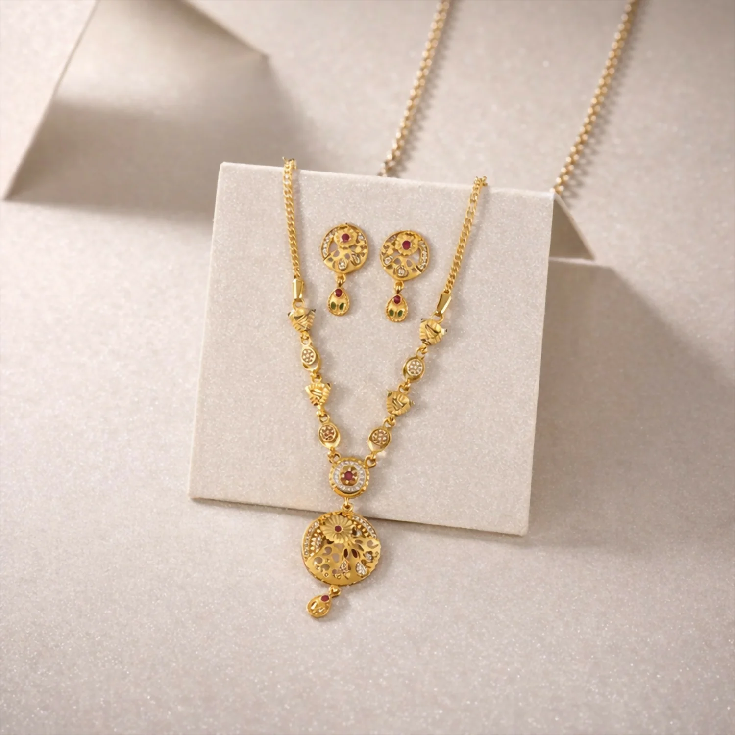 Classic Gold-Tone Floral Engraved Pendant Necklace Set with Designer Stud Earrings - Image 4
