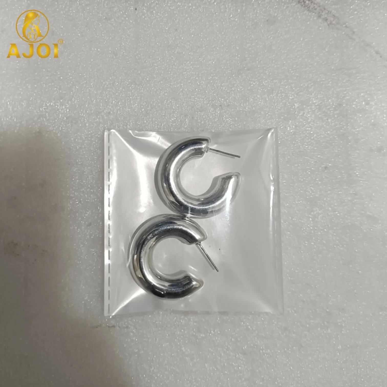 Classic Silver Chunky Hoop Earrings with Bold Curved Design for Elegant Everyday Wear - Image 5