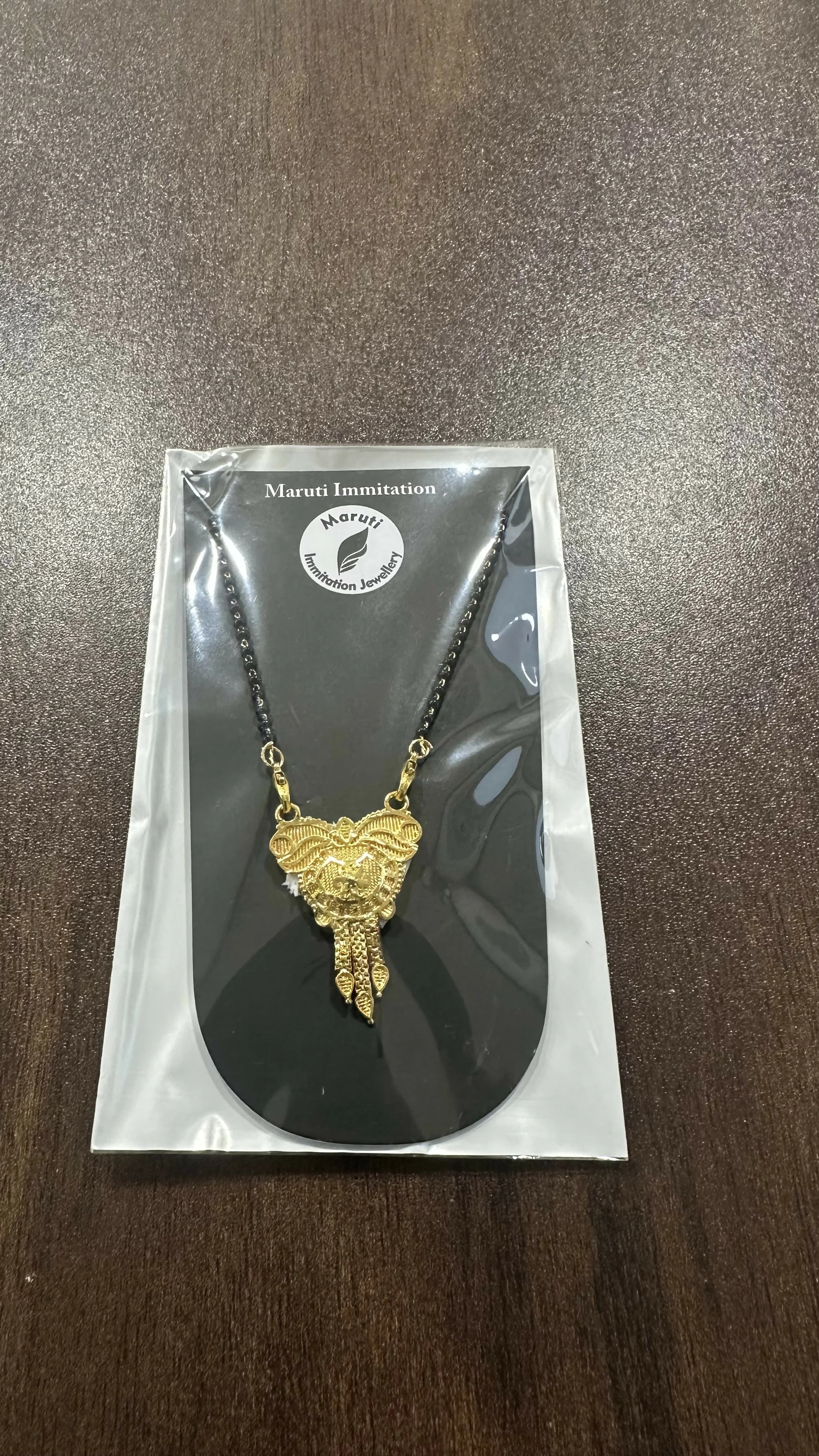 Elegant Gold-Tone Mangalsutra with Intricate Leaf & Dangler Pendant - Image 4