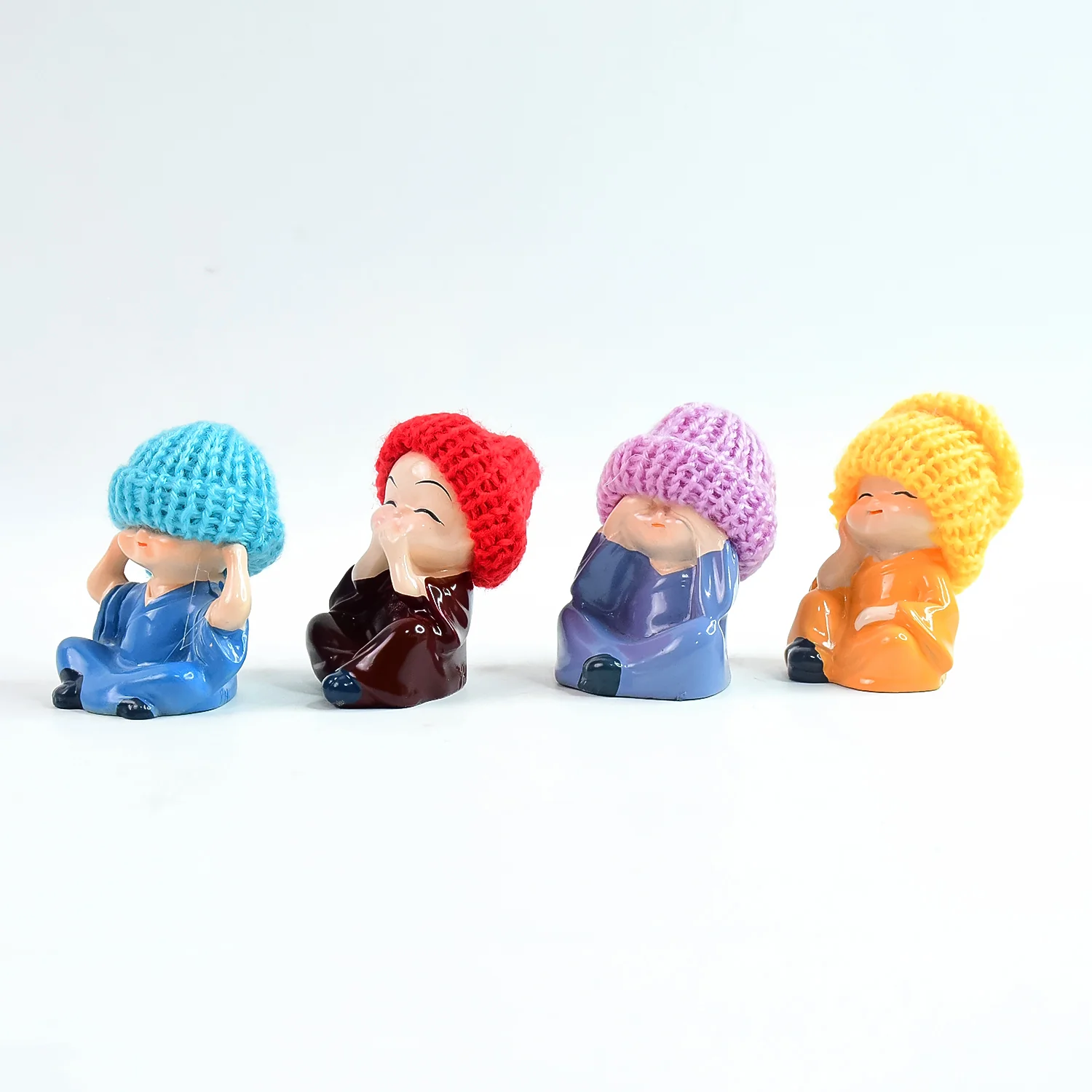 Decorative Resin Monk Buddha Showpiece Set of 4 with Traditional Straw Hats - Image 5