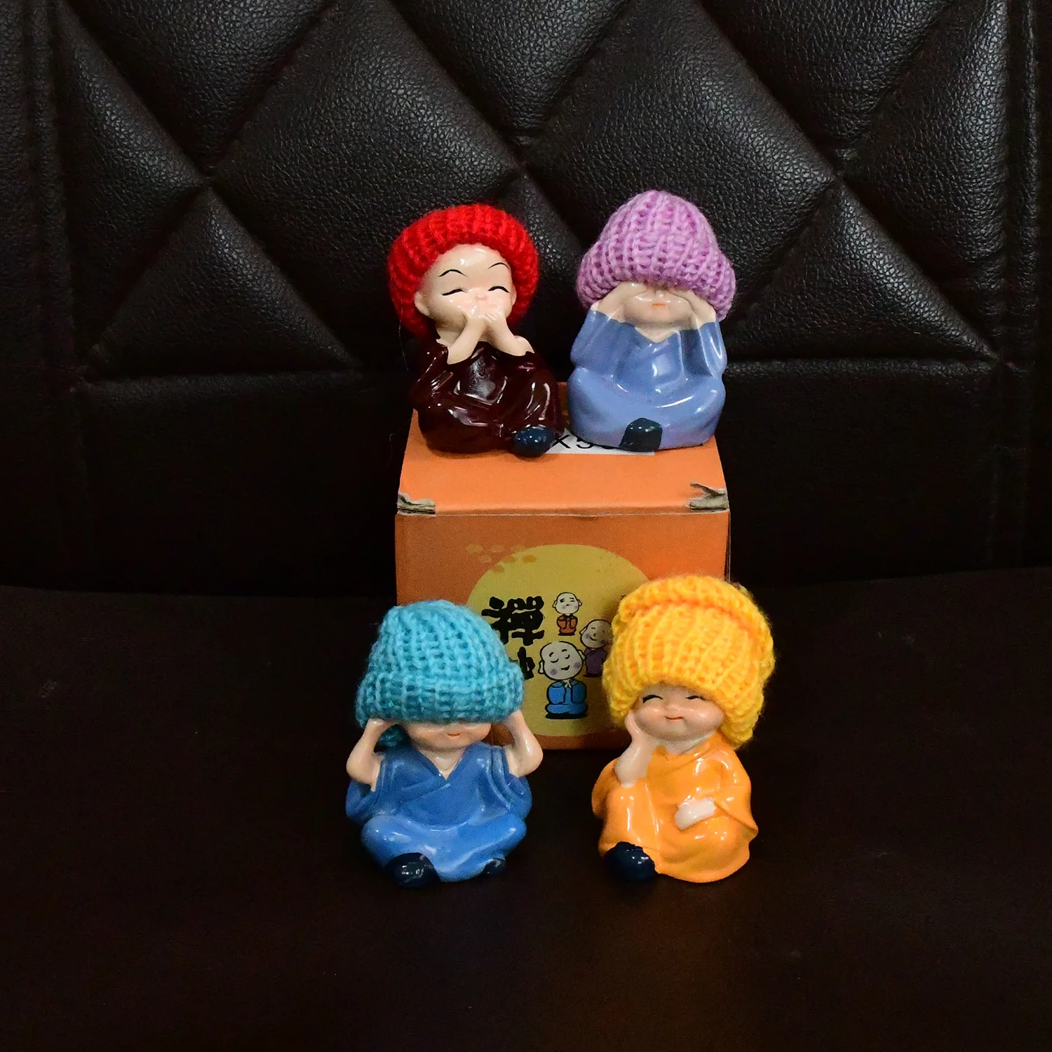 Decorative Resin Monk Buddha Showpiece Set of 4 with Traditional Straw Hats - Image 7