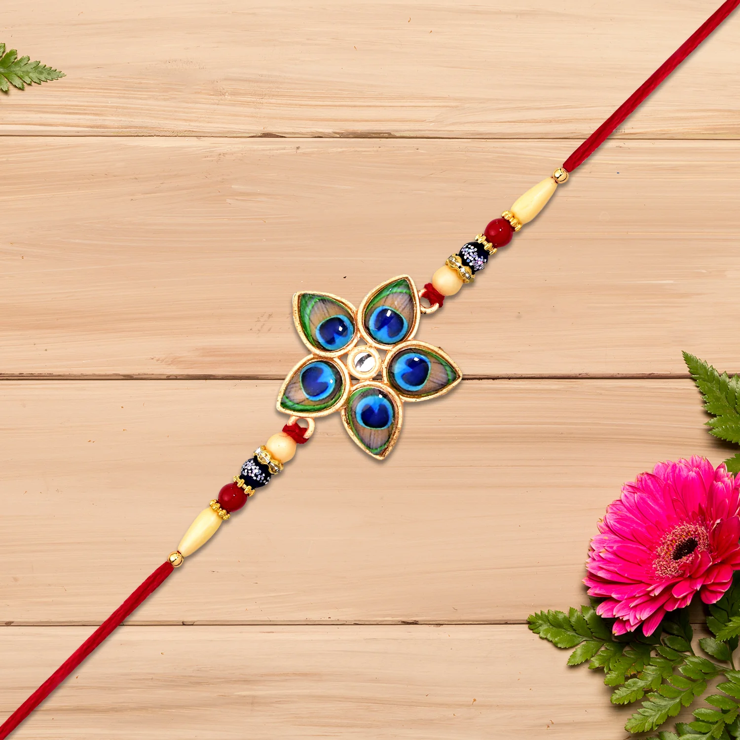 Designer Mor Pankh Rakhi In Star Shape - Image 4