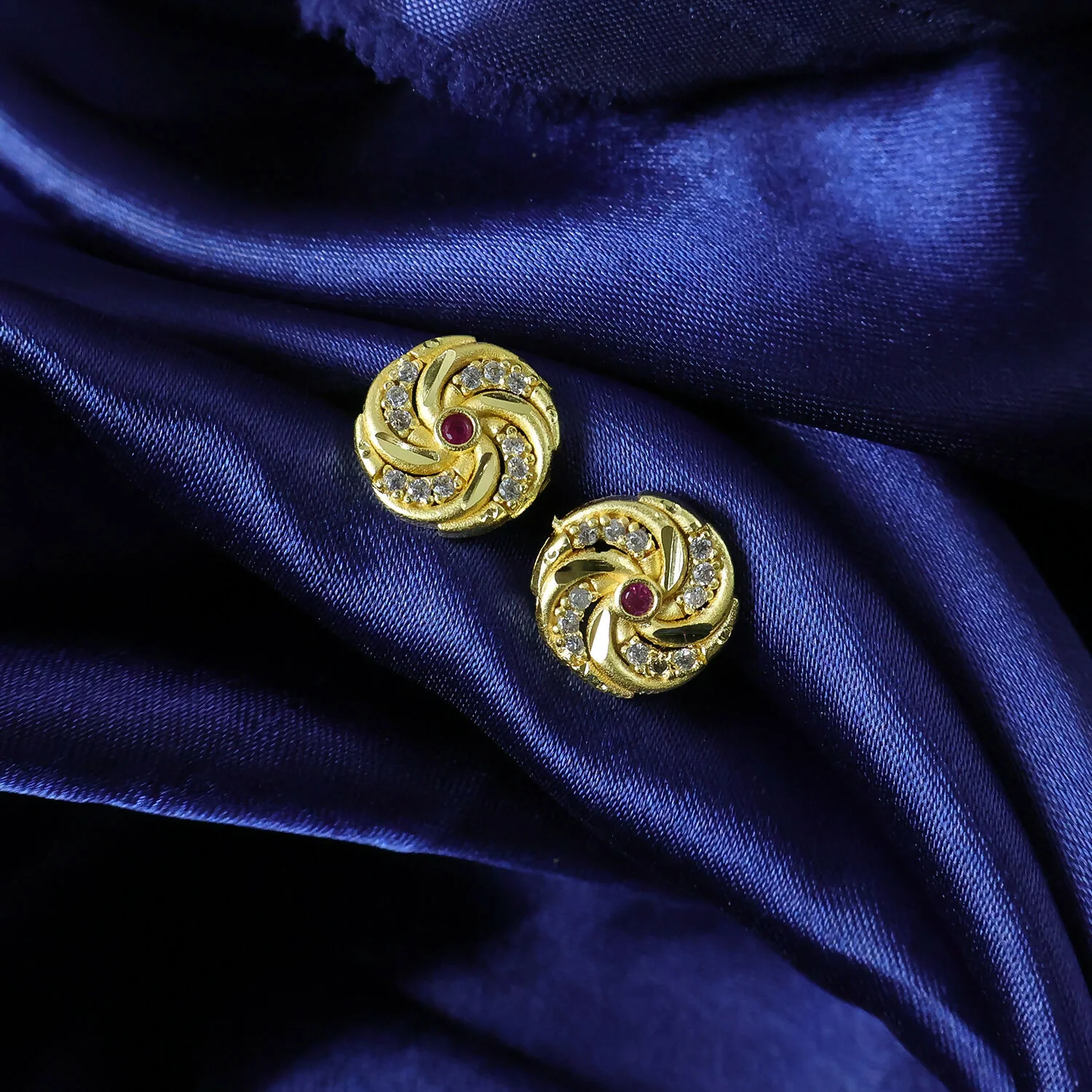 Designer Spiral Pattern Gold Stud Earrings with Red Stone - Image 3