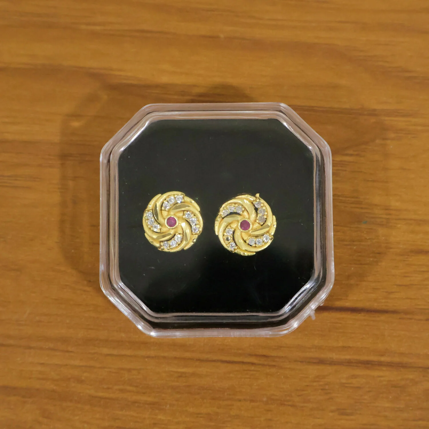Designer Spiral Pattern Gold Stud Earrings with Red Stone - Image 6