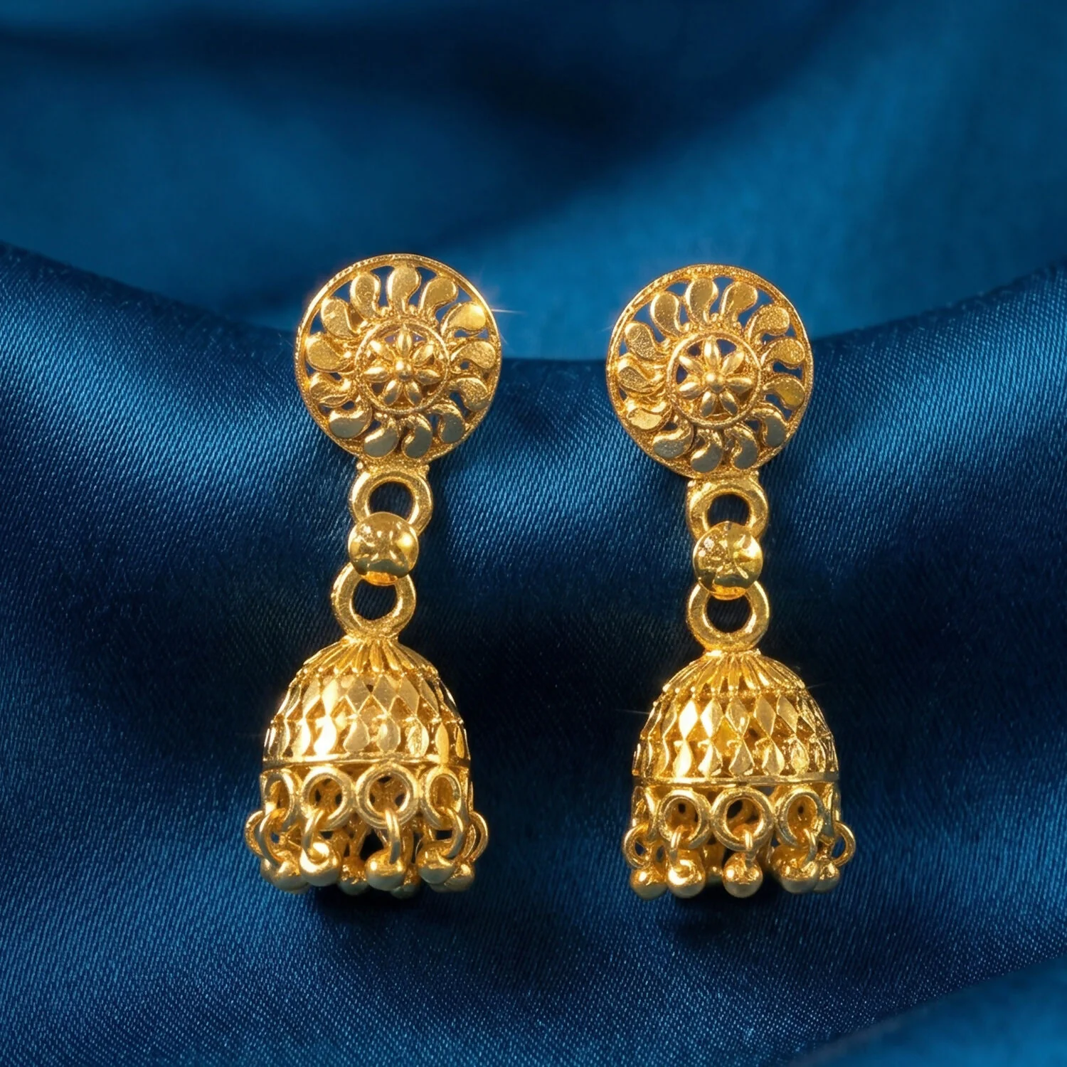 Detailed Gold Jhumka Earrings with Intricate Work and Pearl Accents for Festive Wear - Image 2