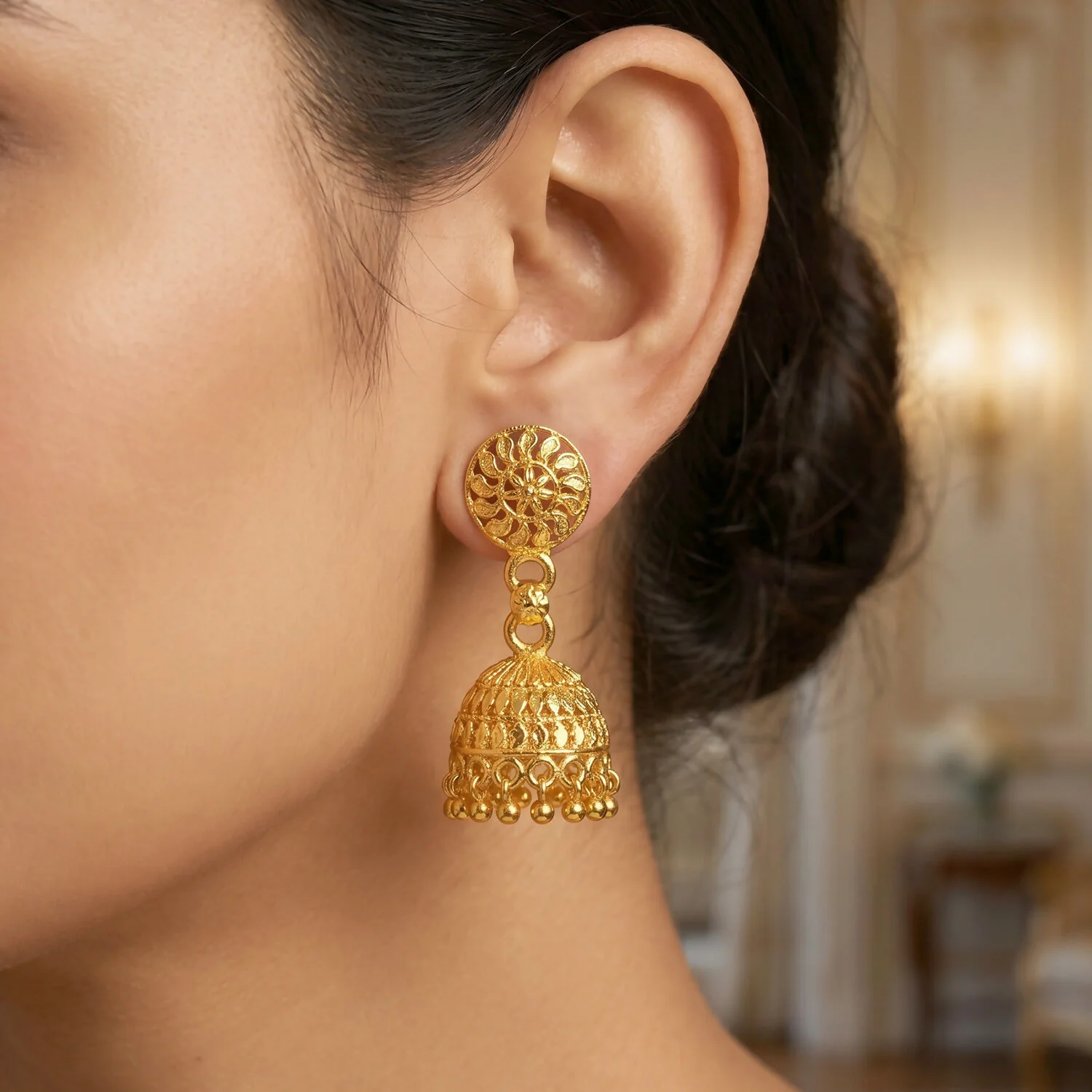 Detailed Gold Jhumka Earrings with Intricate Work and Pearl Accents for Festive Wear - Image 3