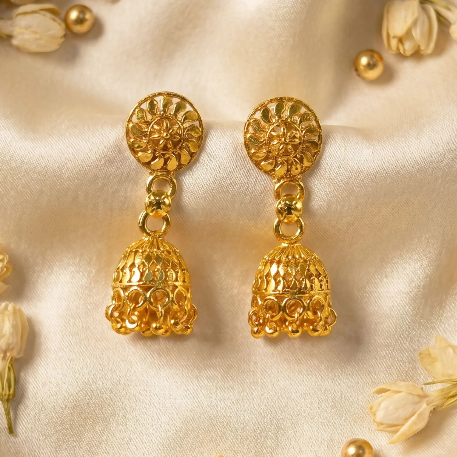 Detailed Gold Jhumka Earrings with Intricate Work and Pearl Accents for Festive Wear - Image 4