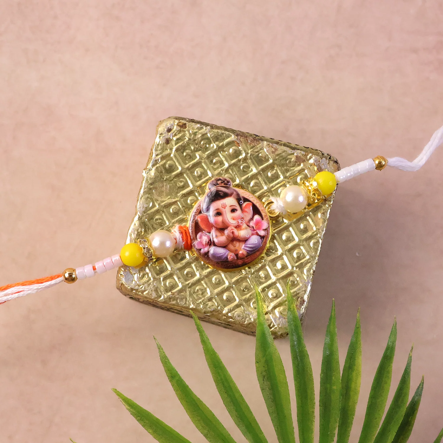 Ganesh Ji Designer Rakhi with Yellow Beads (1 Pc) - Image 5