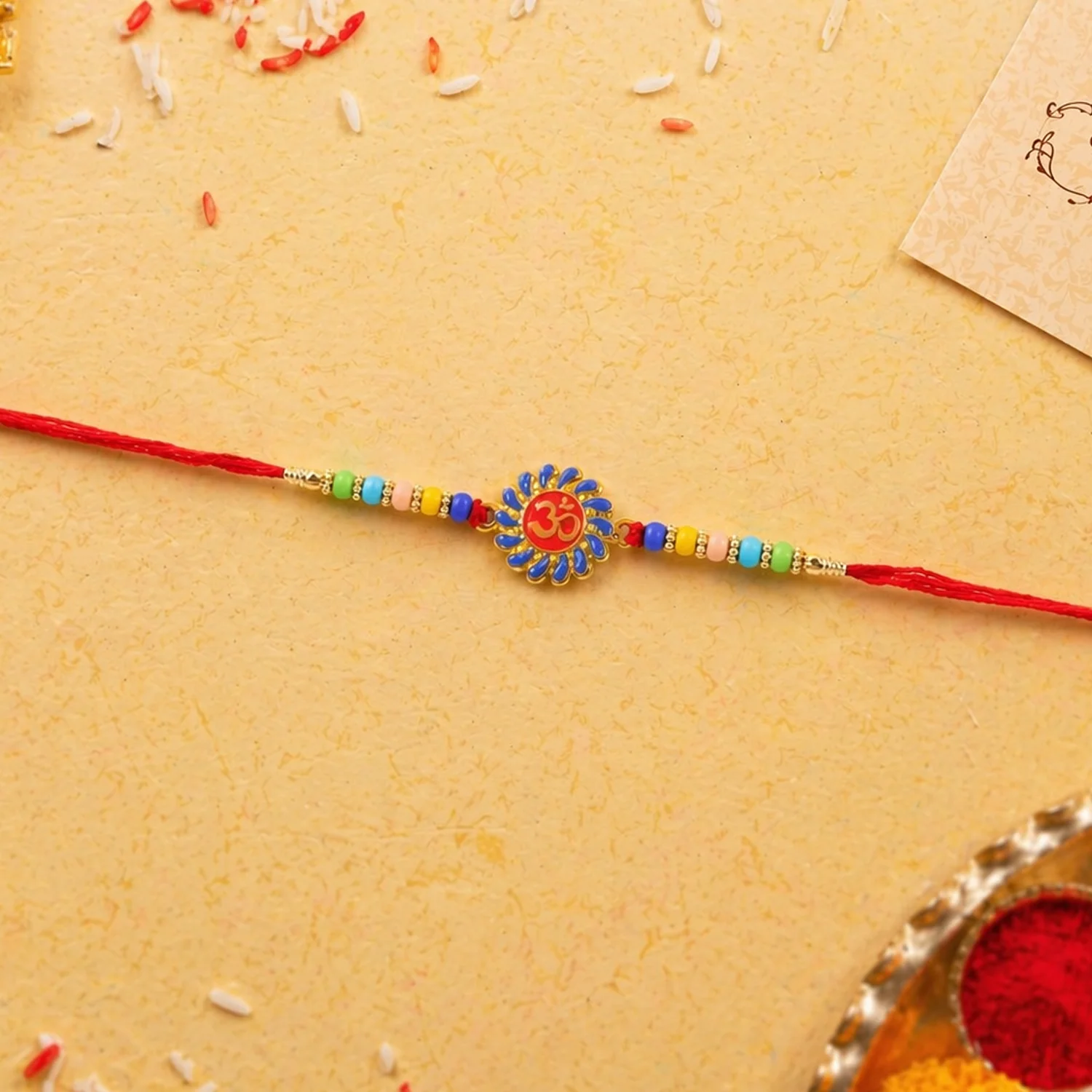 Om Designer Rakhi with Multicolor Beads (1 Pc) - Image 3