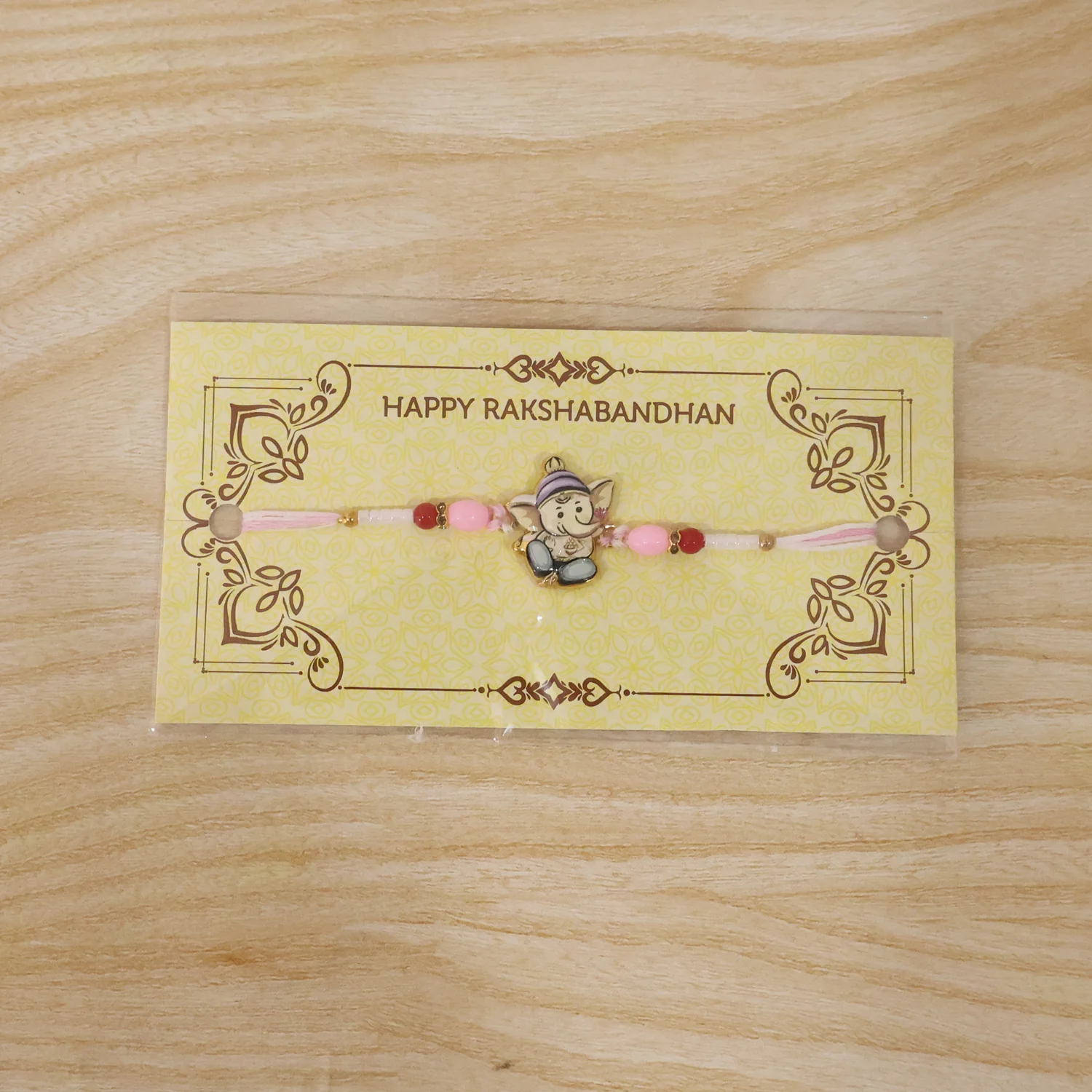 Cute Ganesha Designer Rakhi with Pink and Red Beads (1 Pc) - Image 8
