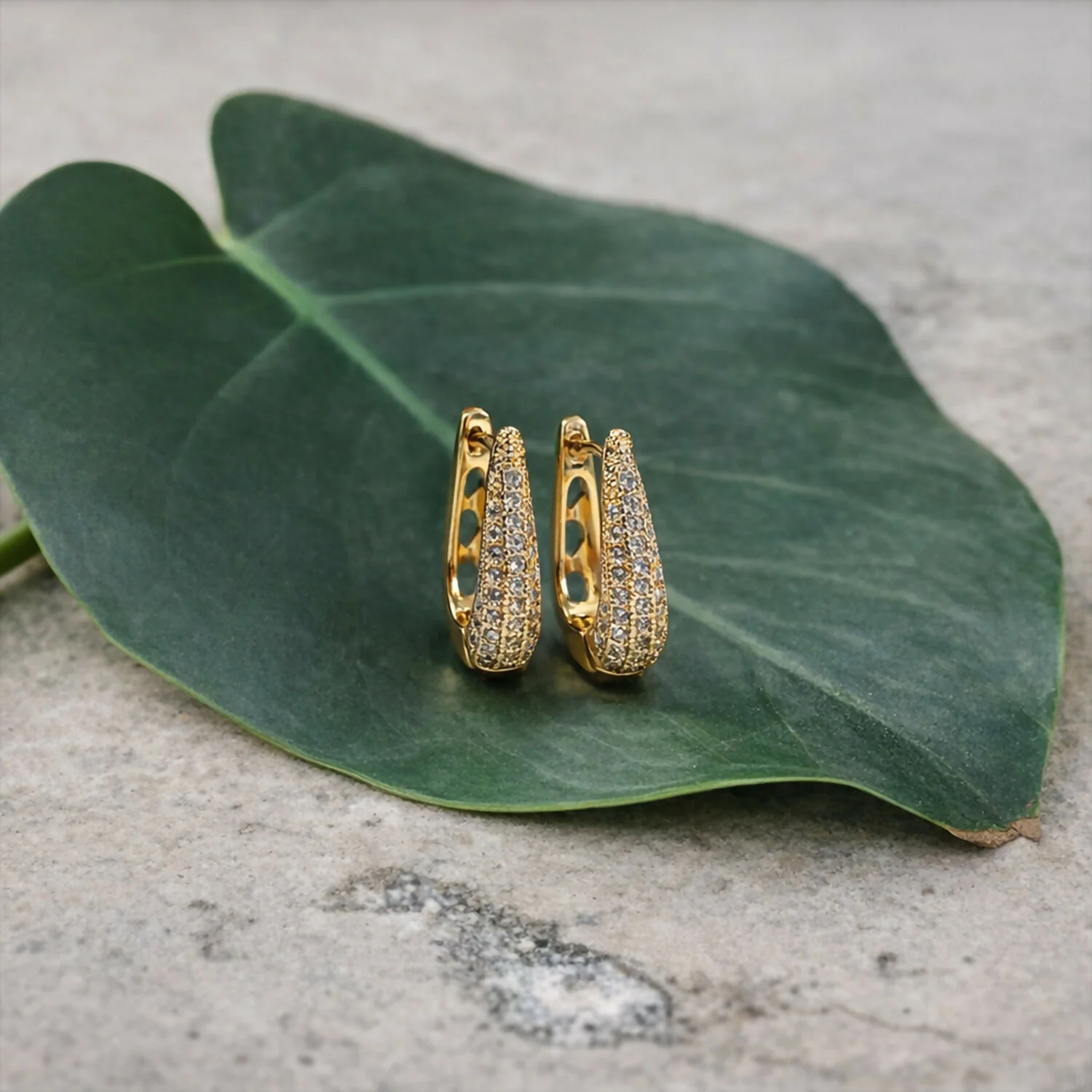 Elegant Curved Pavé Crystal Huggie Earrings in Gold Finish - Image 2