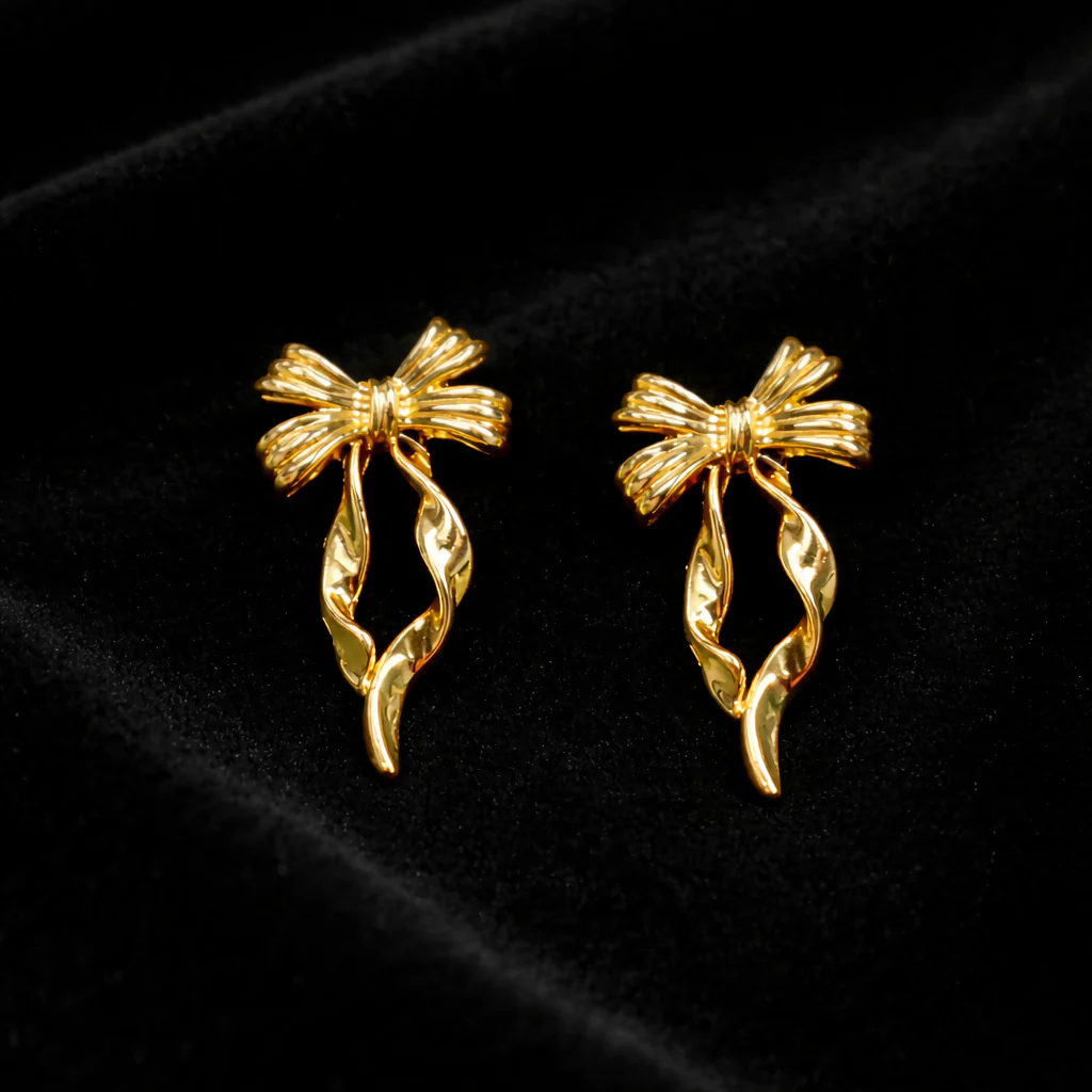 Elegant Gold Bow Drop Earrings for Women Stylish Designer Party Wear Jewelry - Image 2