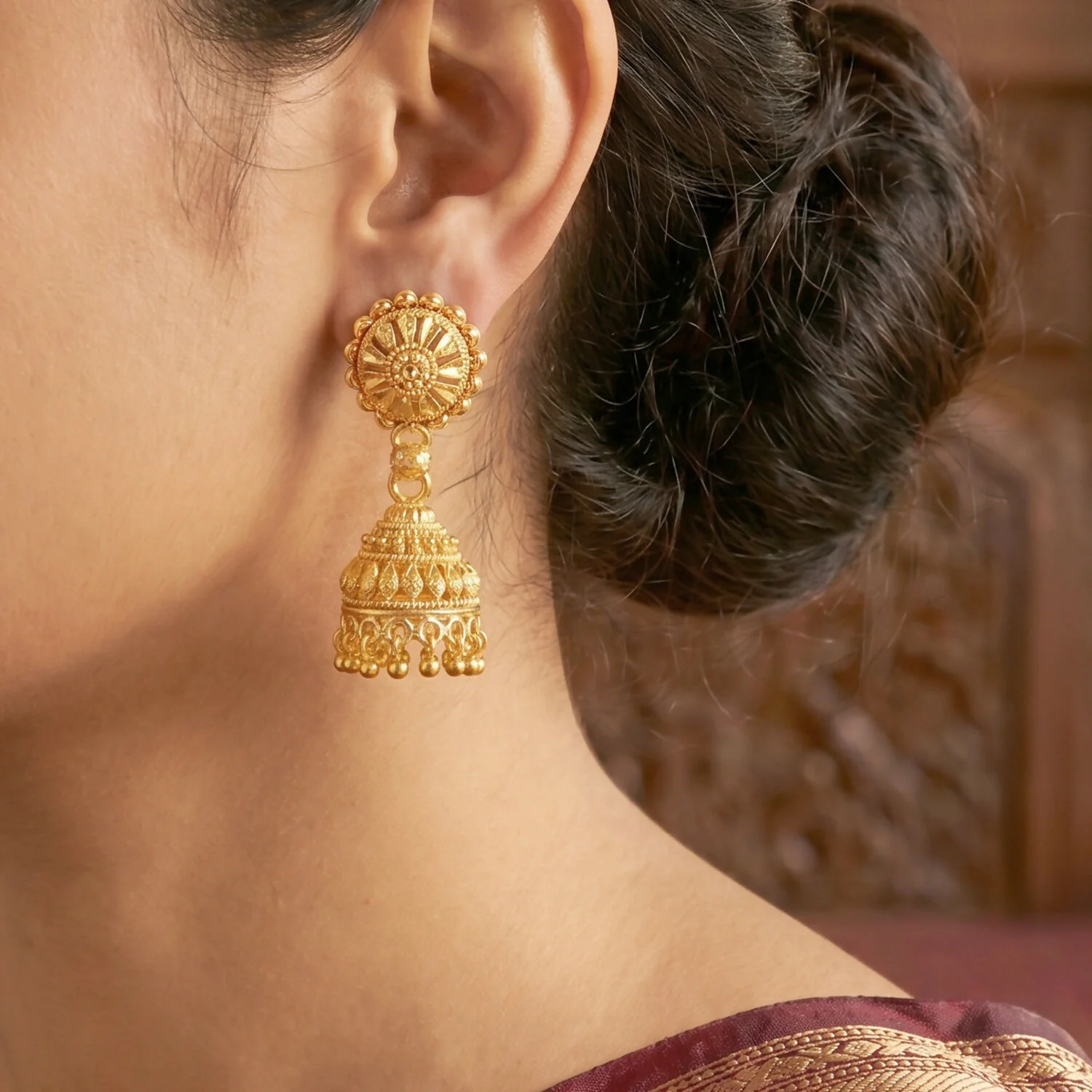 Elegant Gold Jhumka Earrings with Intricate Detailing and Pearls for Bridal Wear - Image 3