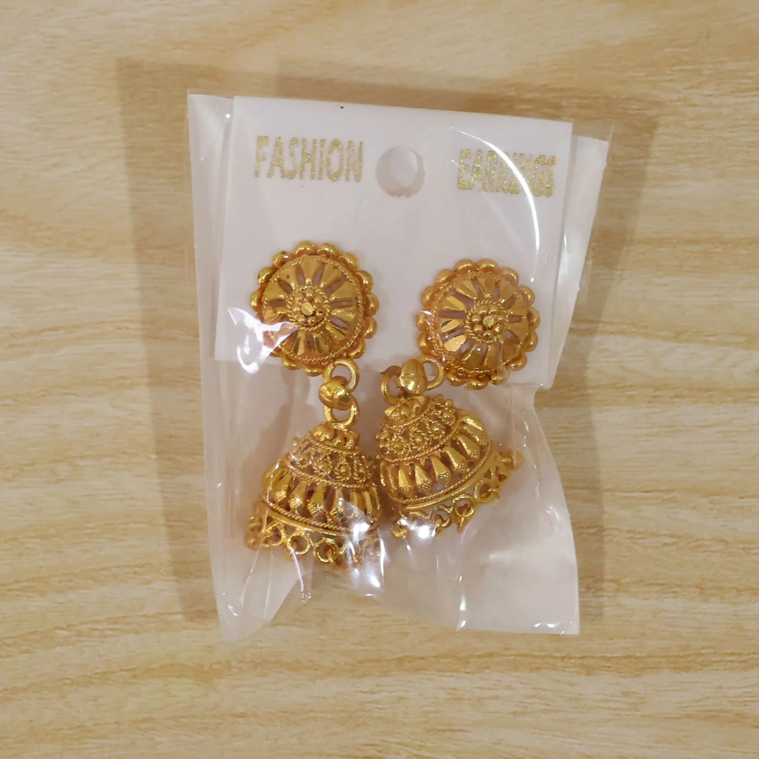 Elegant Gold Jhumka Earrings with Intricate Detailing and Pearls for Bridal Wear - Image 7