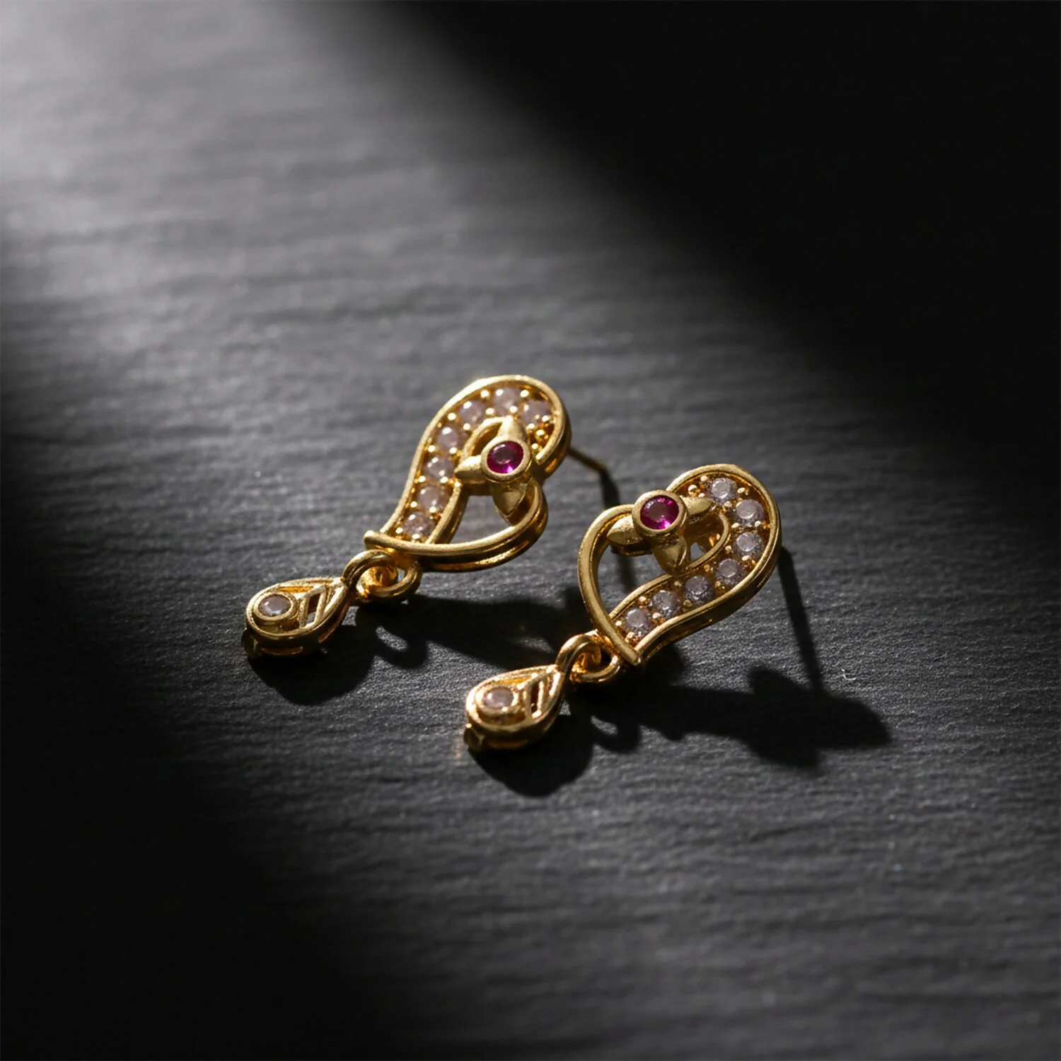 Elegant Gold Paisley Drop Earrings with Ruby Accent - Image 2