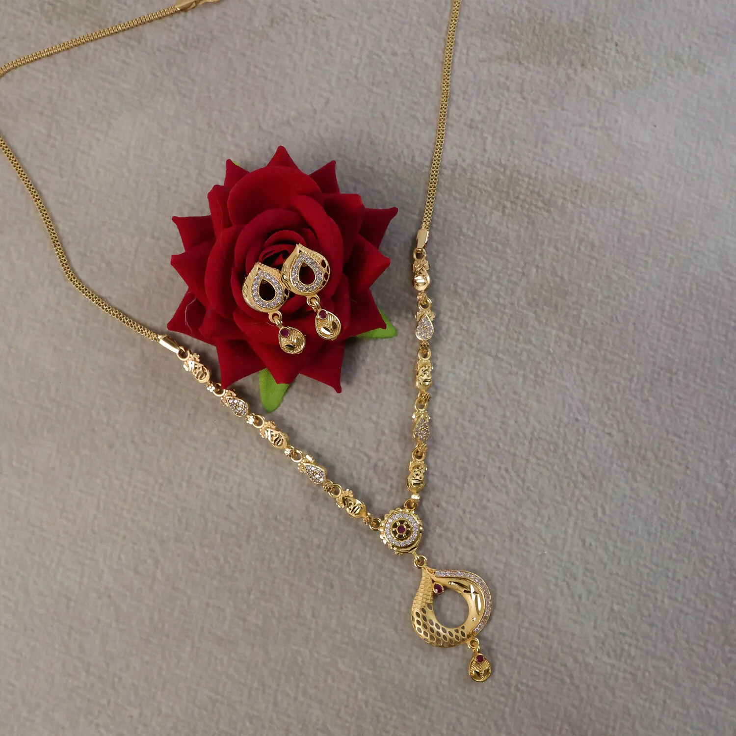Elegant Gold-Tone Teardrop Pendant Necklace Set with Minimal Chain Design & Matching Earrings - Image 2