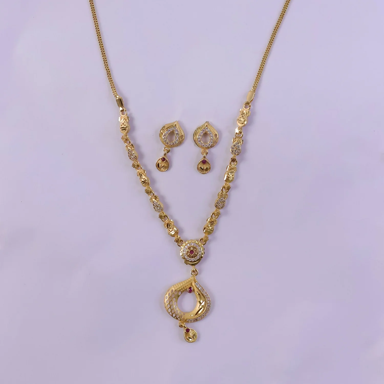 Elegant Gold-Tone Teardrop Pendant Necklace Set with Minimal Chain Design & Matching Earrings - Image 5