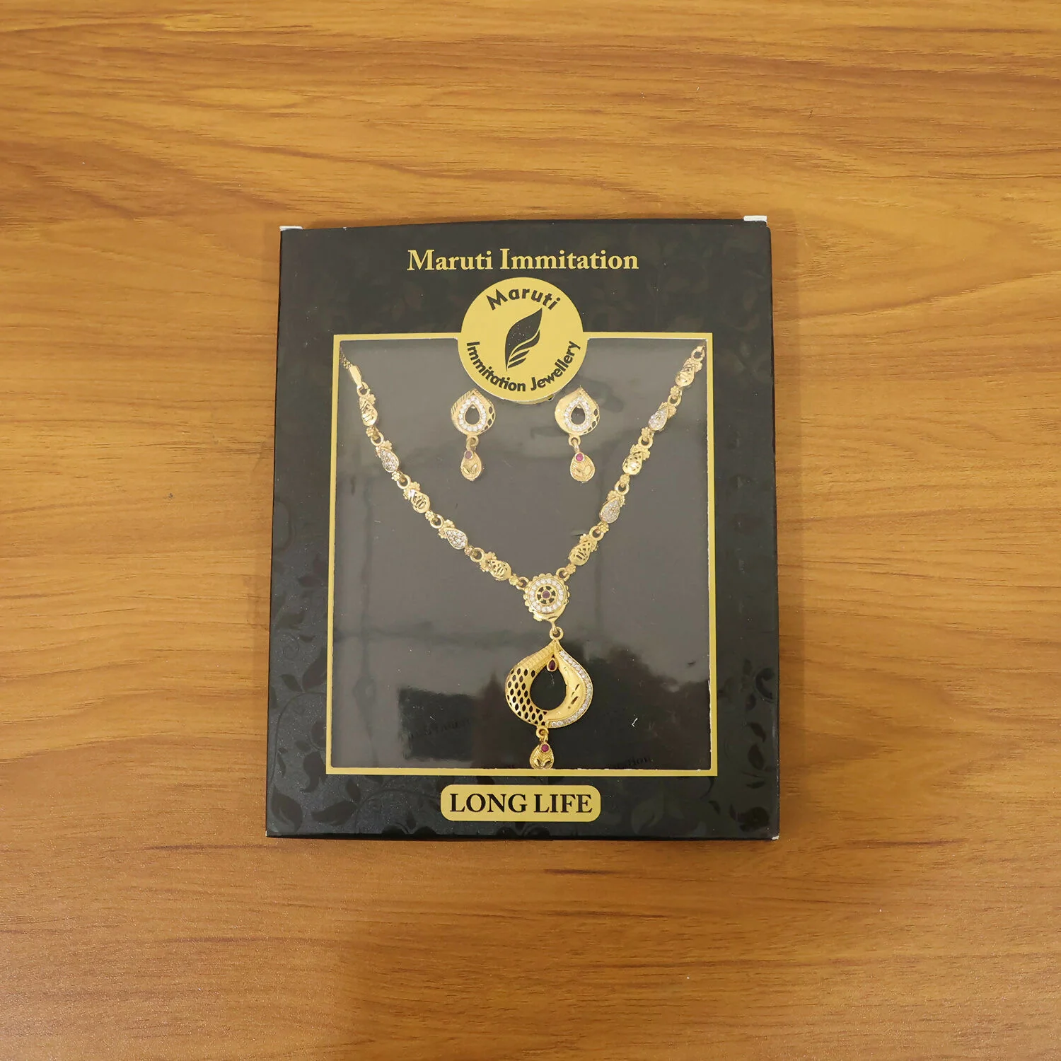 Elegant Gold-Tone Teardrop Pendant Necklace Set with Minimal Chain Design & Matching Earrings - Image 6