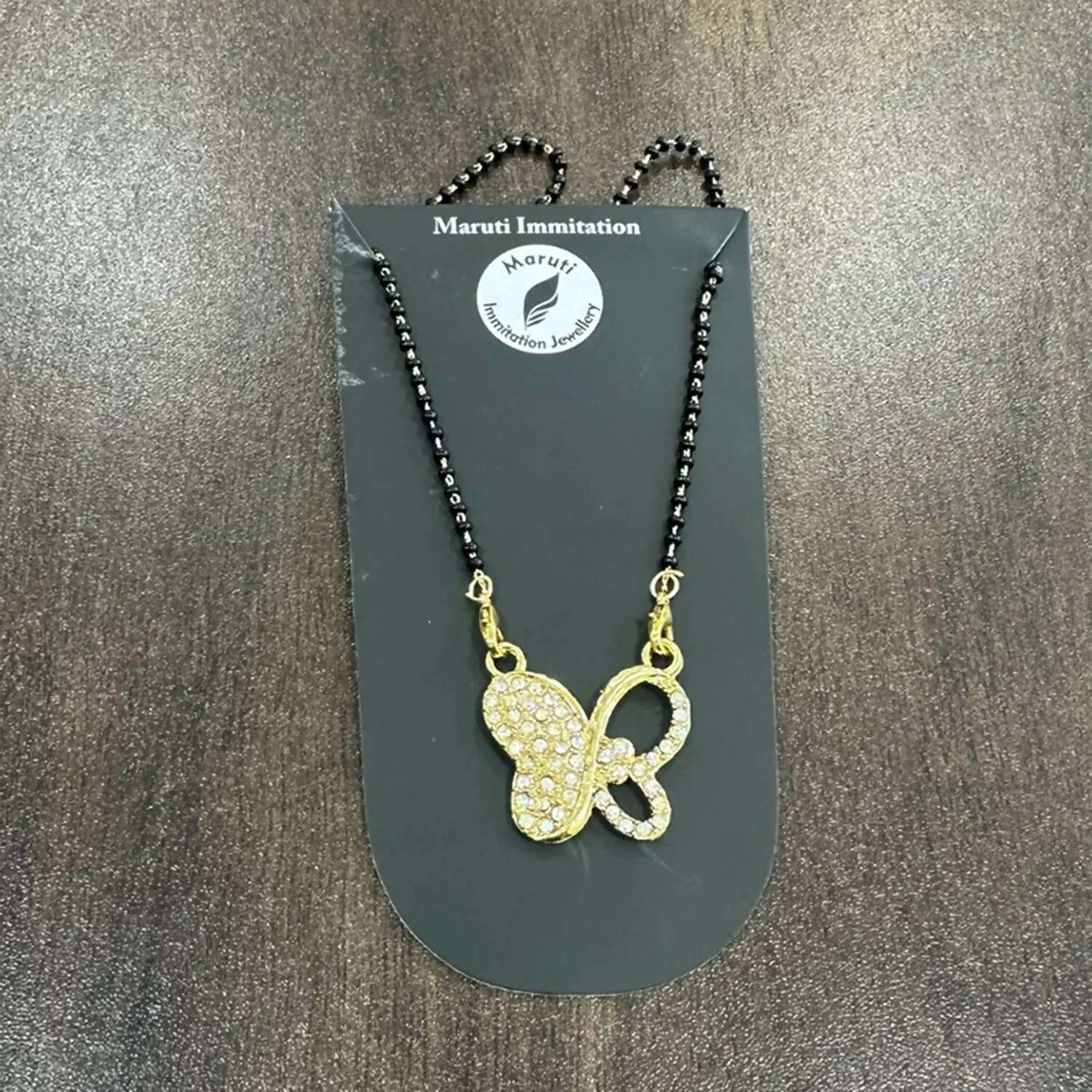 Elegant Gold-Toned Butterfly Design Mangalsutra with Sparkling Stone Pendant - Image 4