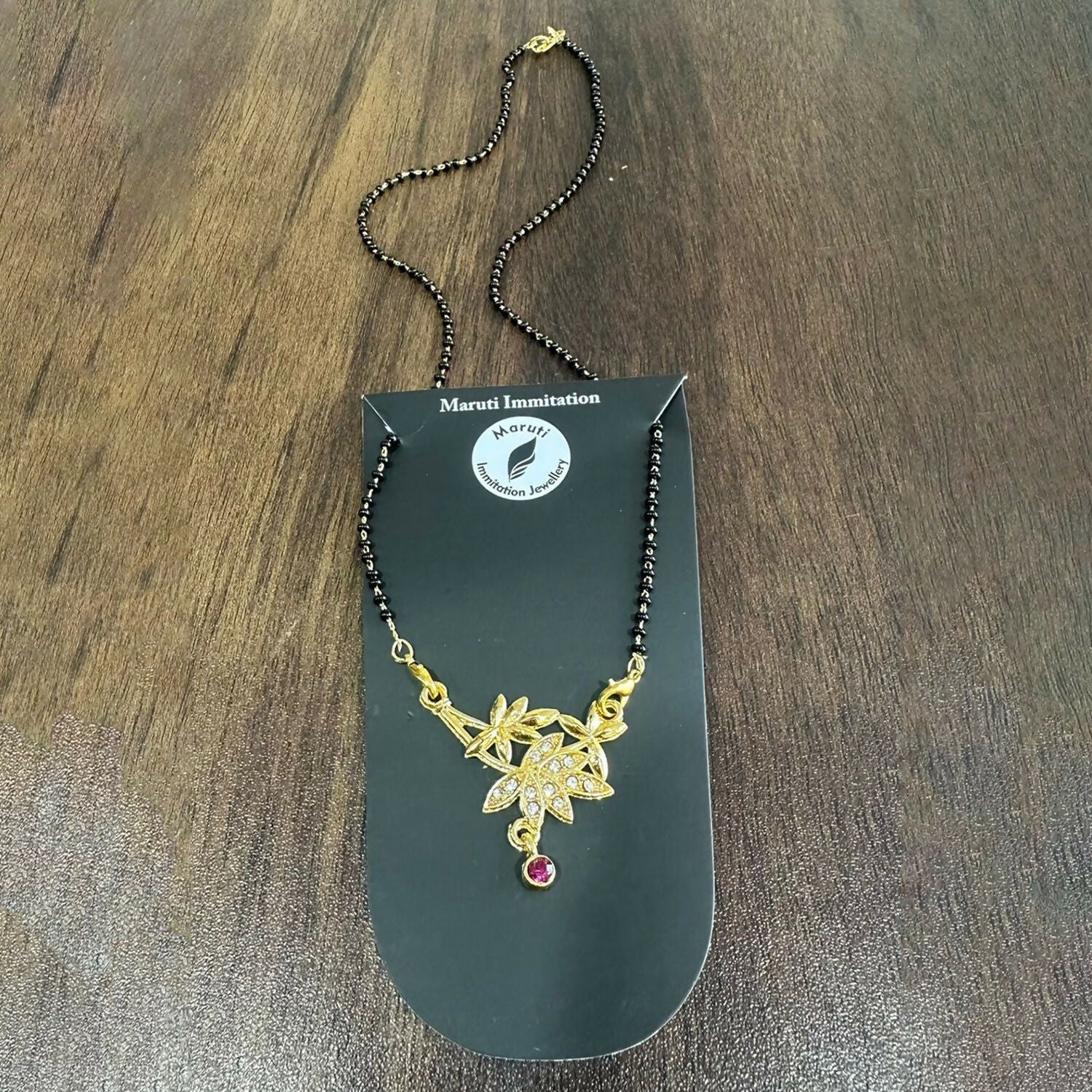Elegant Gold-Toned Floral Mangalsutra with Stone-Studded Pendant for Women - Image 4