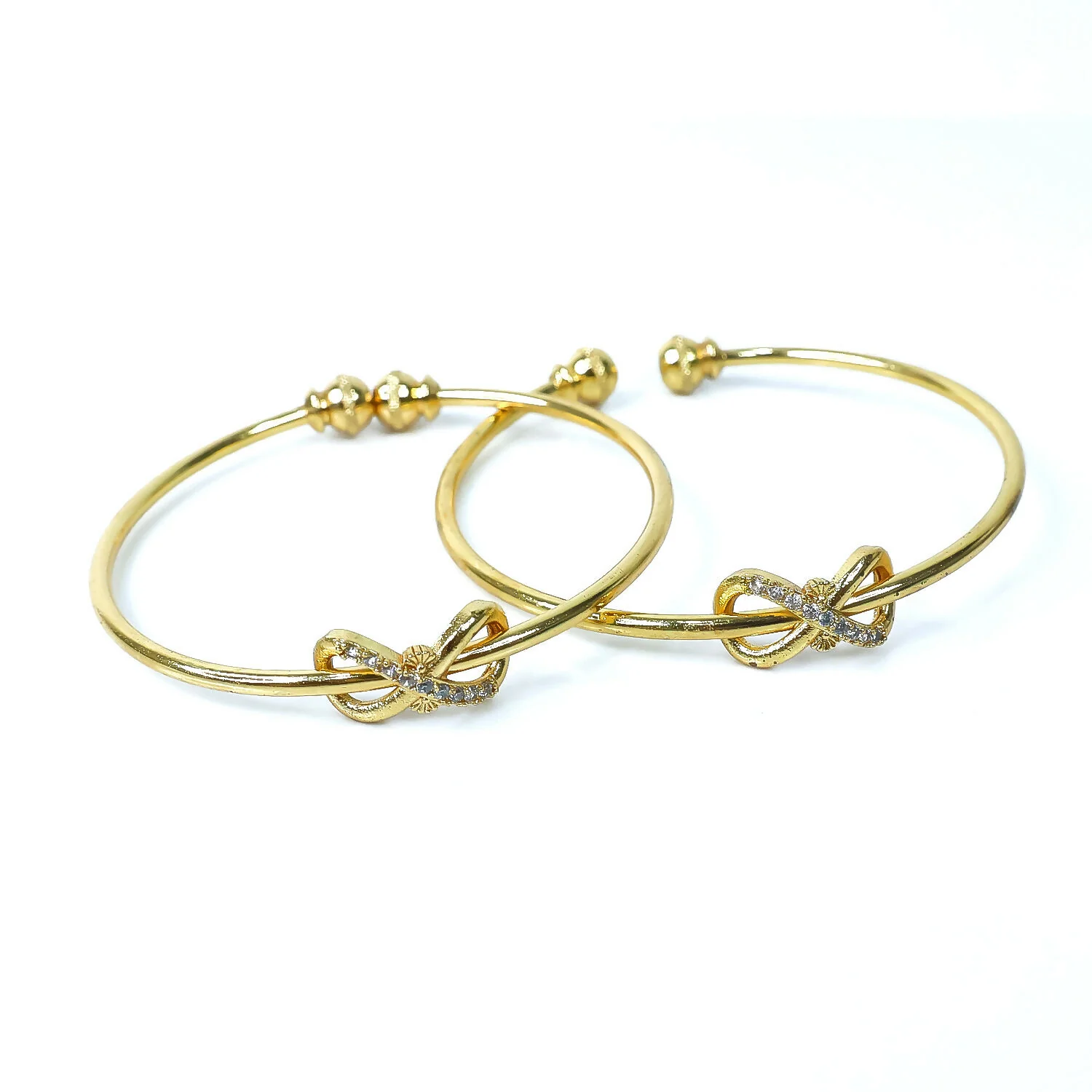 Elegant Knot Design Bangles with Stone Detailing - Image 3