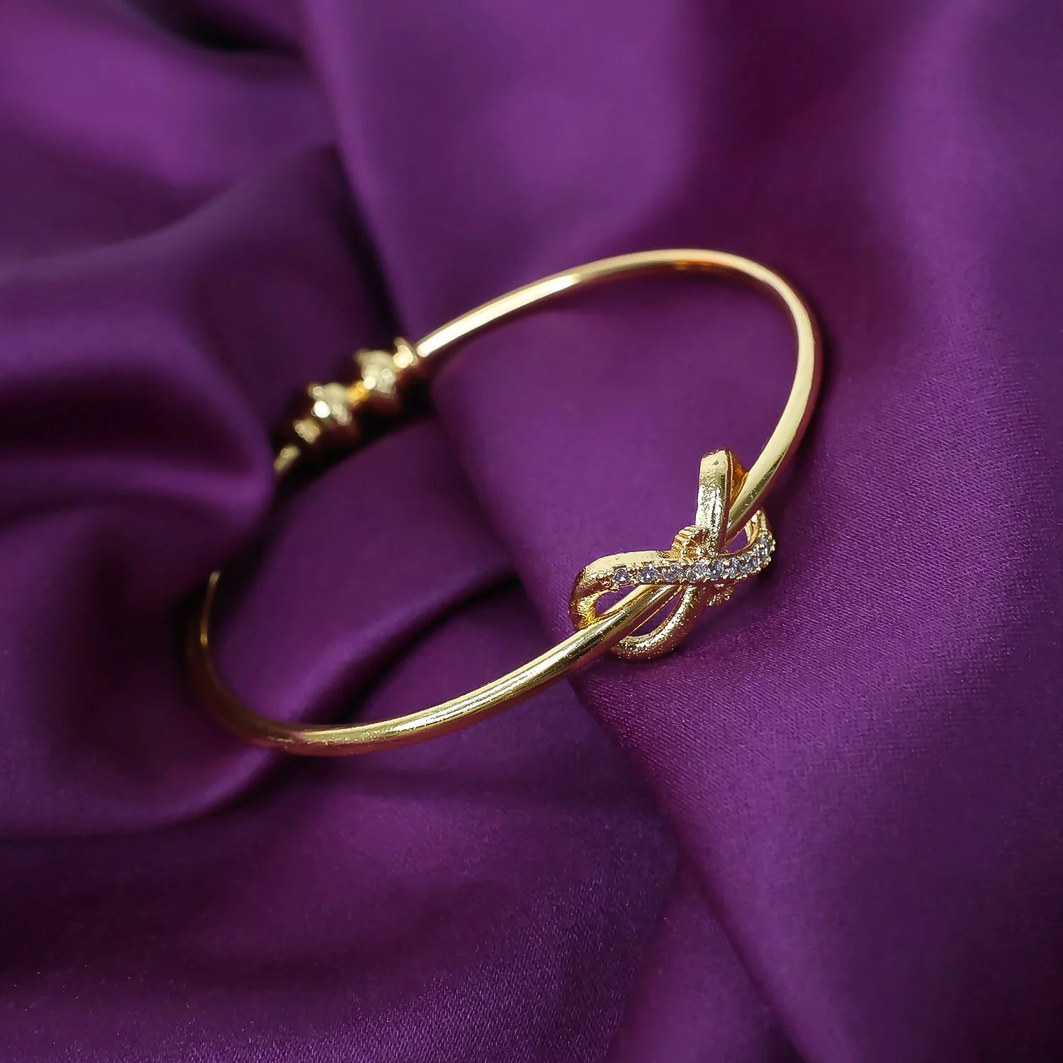 Elegant Knot Design Bangles with Stone Detailing - Image 5
