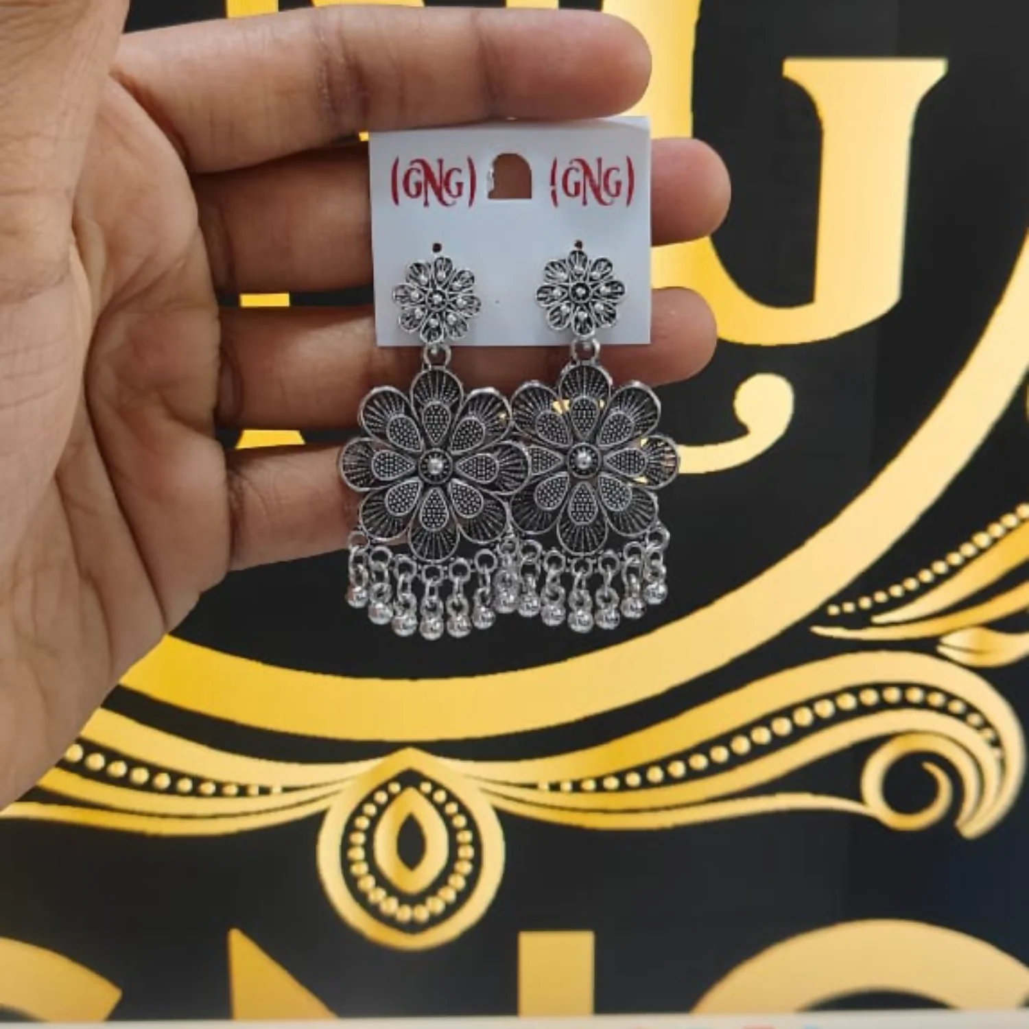 Elegant Oxidised Silver Jhumka Earings With Layered Floral Design - Image 4