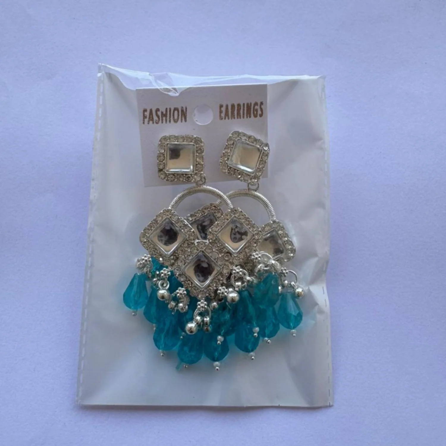 Elegant Silver Plated Chandelier Earrings Featuring Square Crystals and Aqua Blue Teardrop Beads - Image 5
