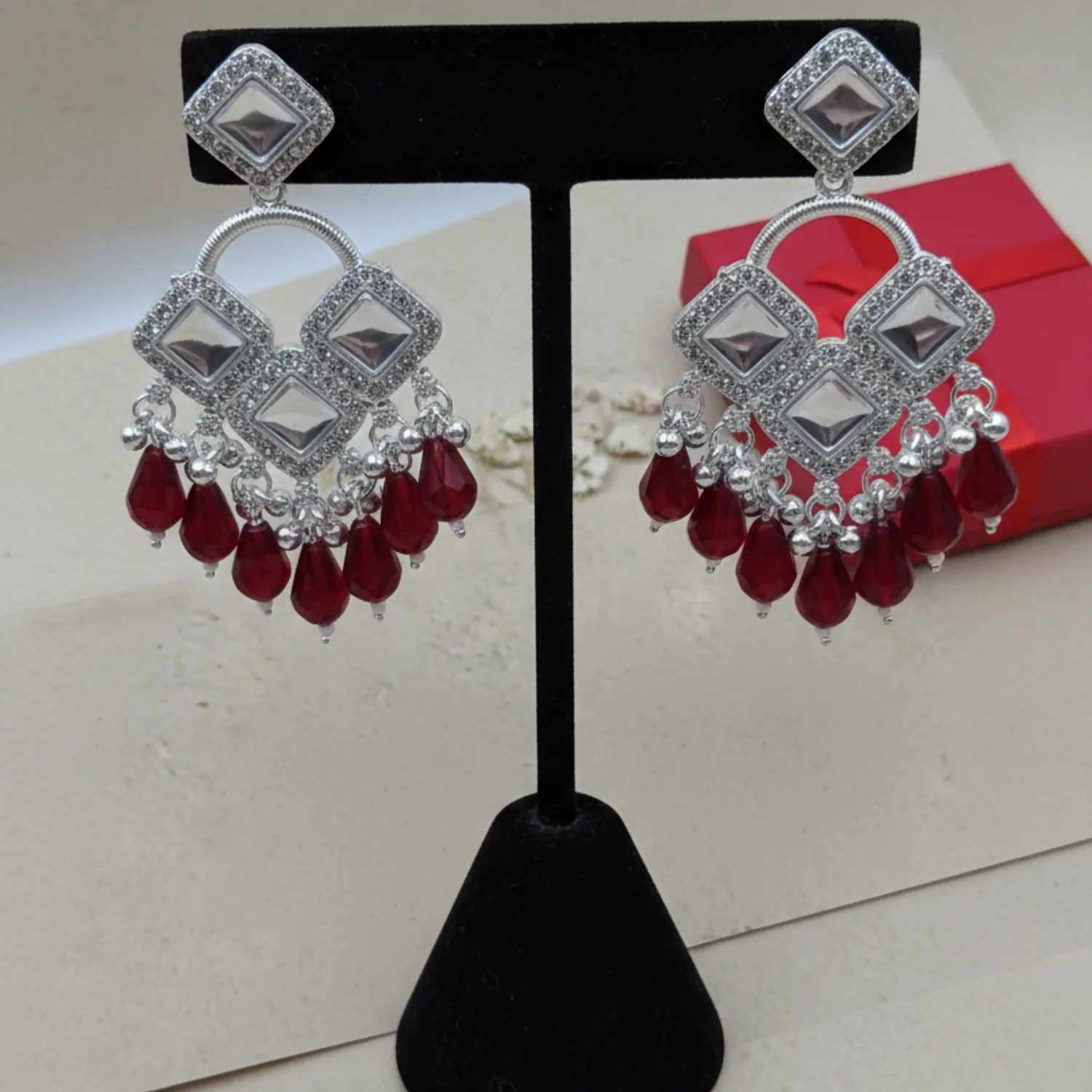 Elegant Silver Plated Chandelier Earrings Featuring Square Crystals and Maroon Teardrop Beads - Image 3