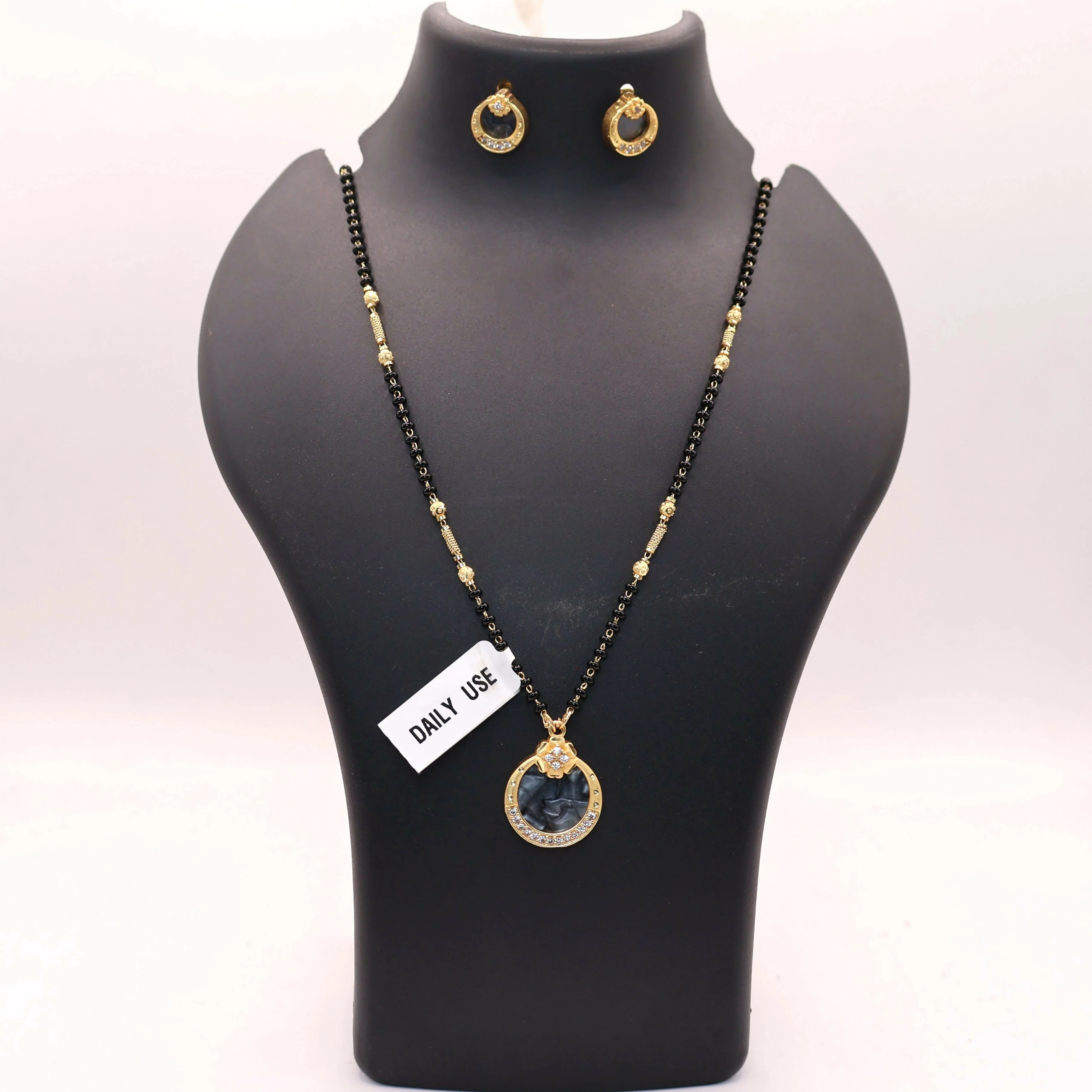 Gold Plated AD Circular Stud Earrings and mangalsutra with Grey Stone for women - Image 3