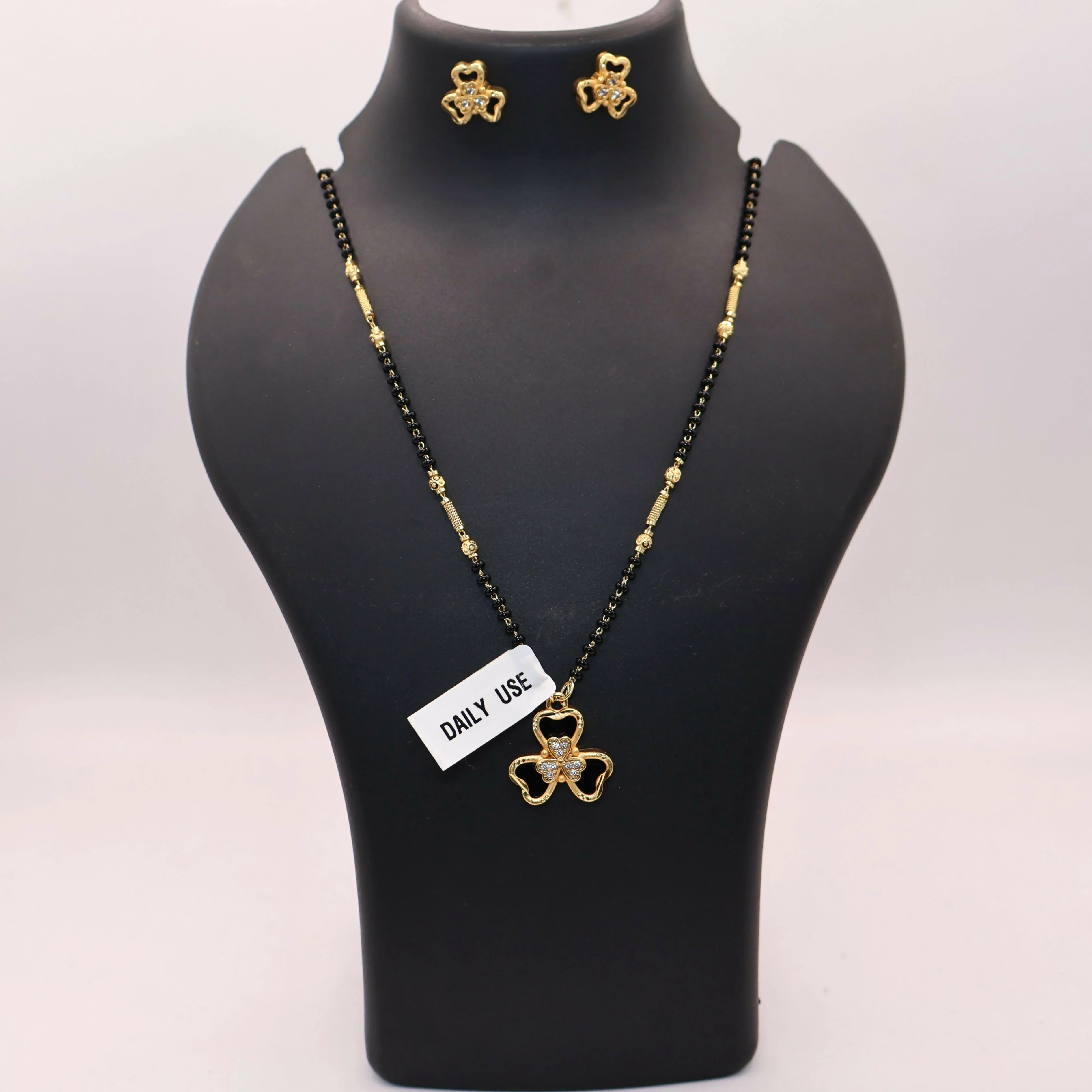 Gold-Plated AD Floral Mangalsutra Set with Clover Stud Earrings for women - Image 3