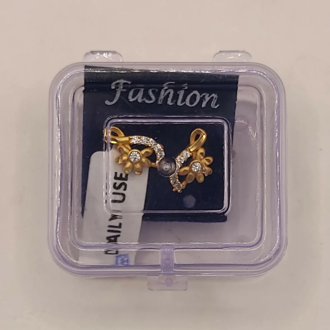 Gold Plated Floral S-Curve Stud Earrings with AD for women and girls - Image 5