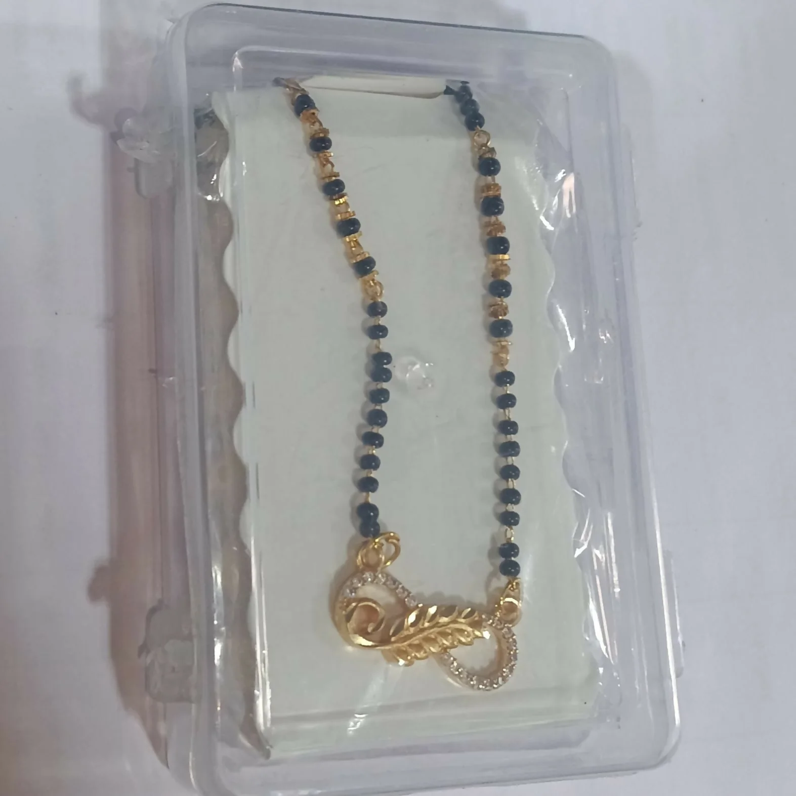 Gold Plated Infinity Leaf AD Mangalsutra with Black Beads for women - Image 4