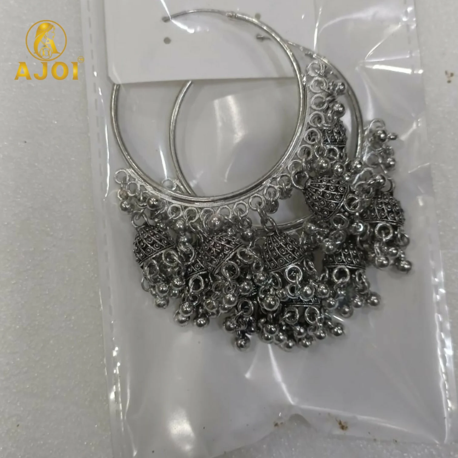 Handcrafted Oxidized Silver Hoop Jhumka Earrings with Intricate Filigree Detailing and Multiple Dangling Bell Drops - Image 6