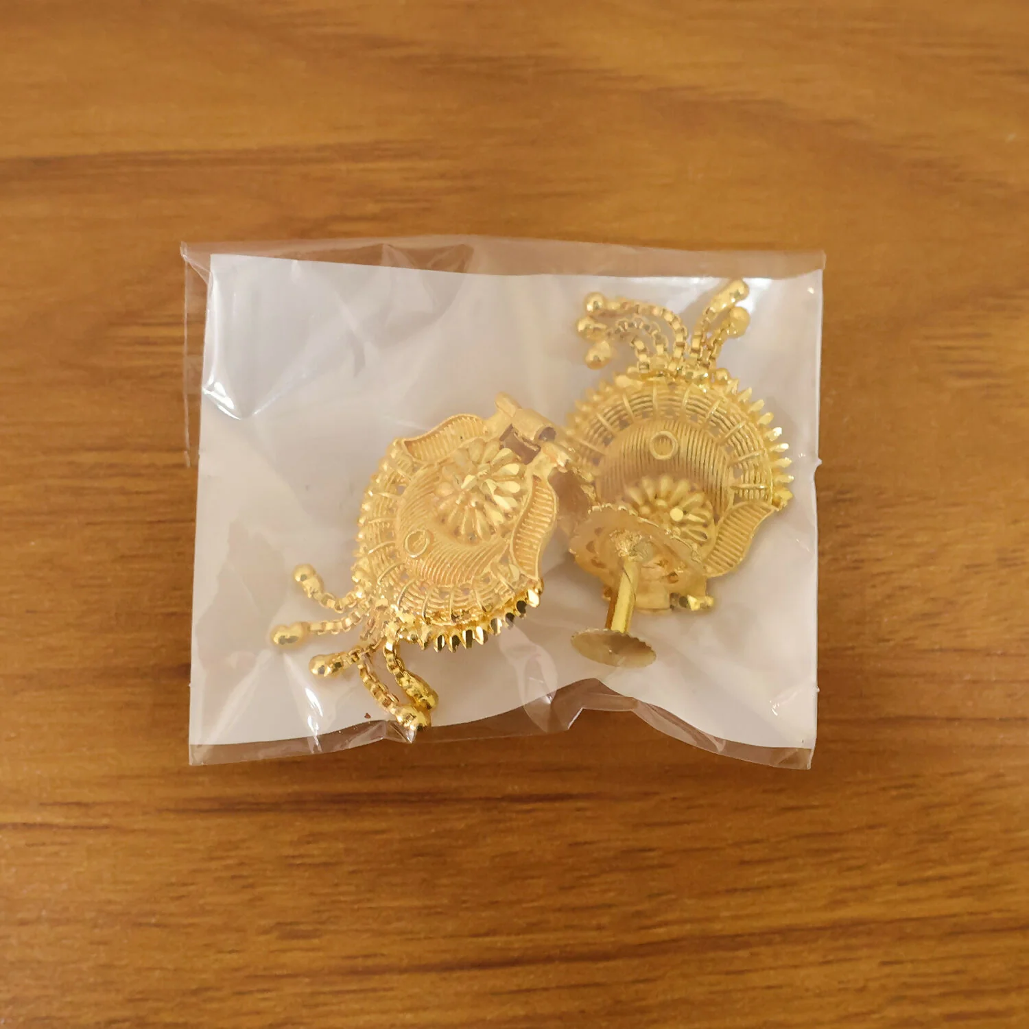 Handcrafted South Indian Heritage Gold Earrings with Intricate Leaf Motif and Classic Jhumka Dangles - Image 6