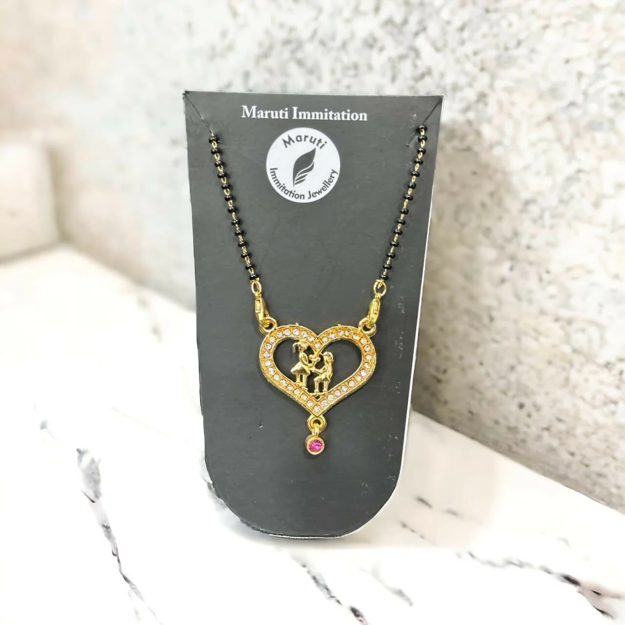 Gold-Tone Heart Mangalsutra with Intricate Couple Pendant and Stone Detailing - Image 2