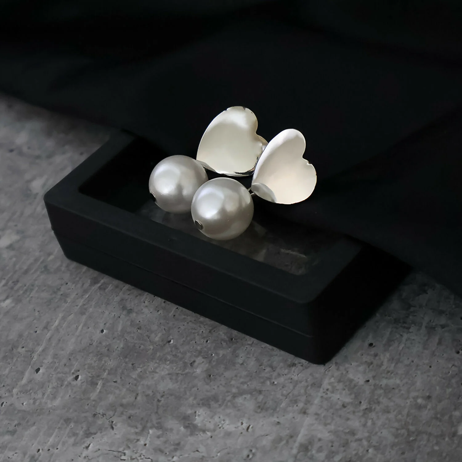 Heart-Shaped Stud Earrings with Dangling Pearls in Elegant Display Case - Image 6