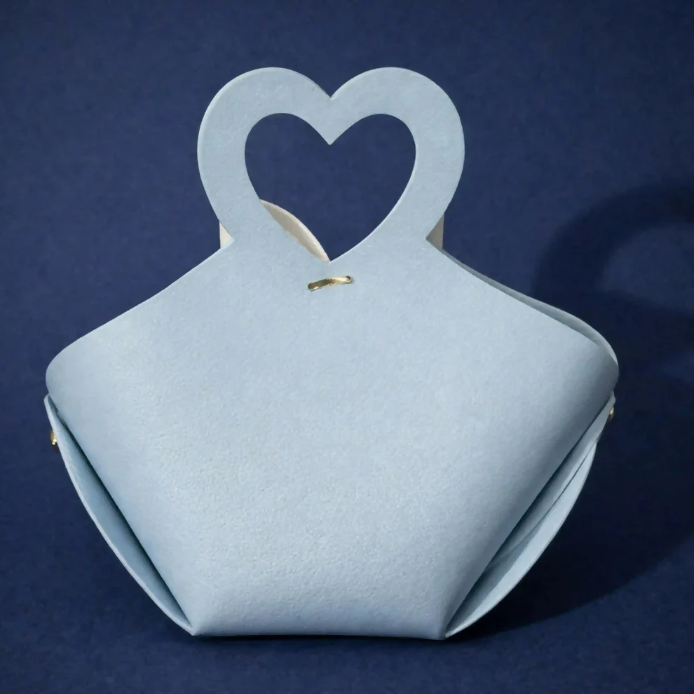 Light Blue Mini Cute Handbag with Heart Handle and Bow Design - Image 4