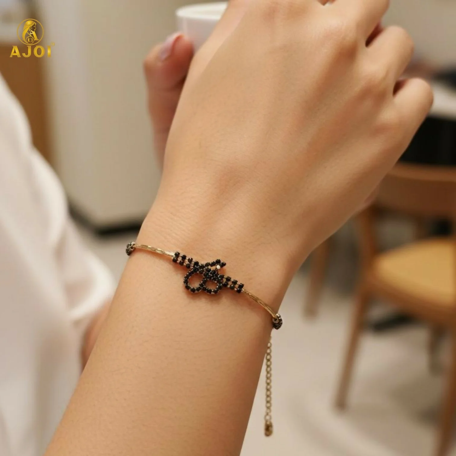 Luxury Rose Gold Adjustable Bow Charm Bracelet - Image 2