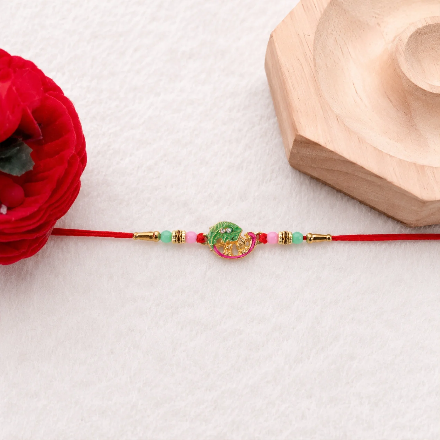 Mini Krishna with Peacock Leaf Designer Rakhi - Image 4