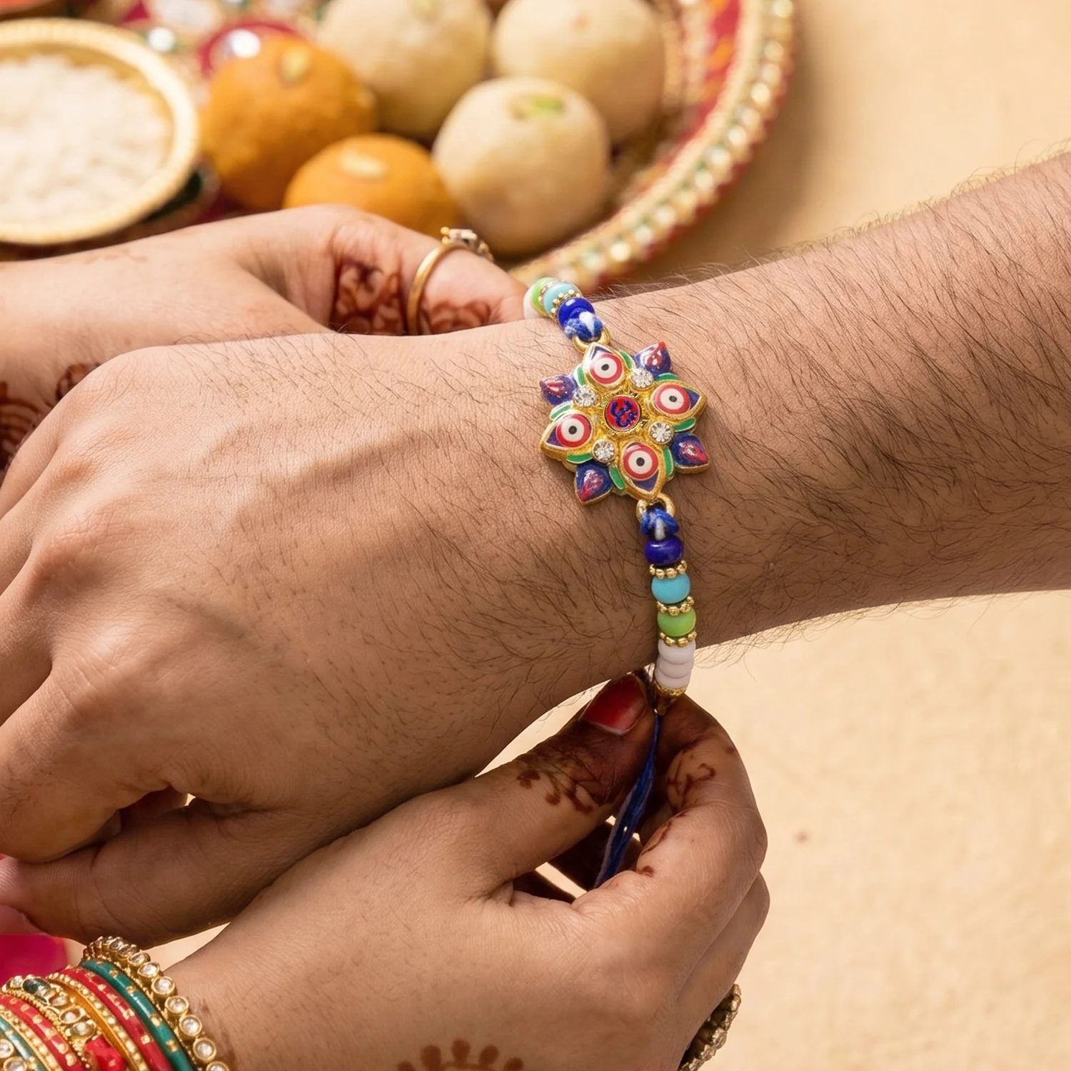 Multi Evil Eye OM Star Designer Rakhi - Image 2
