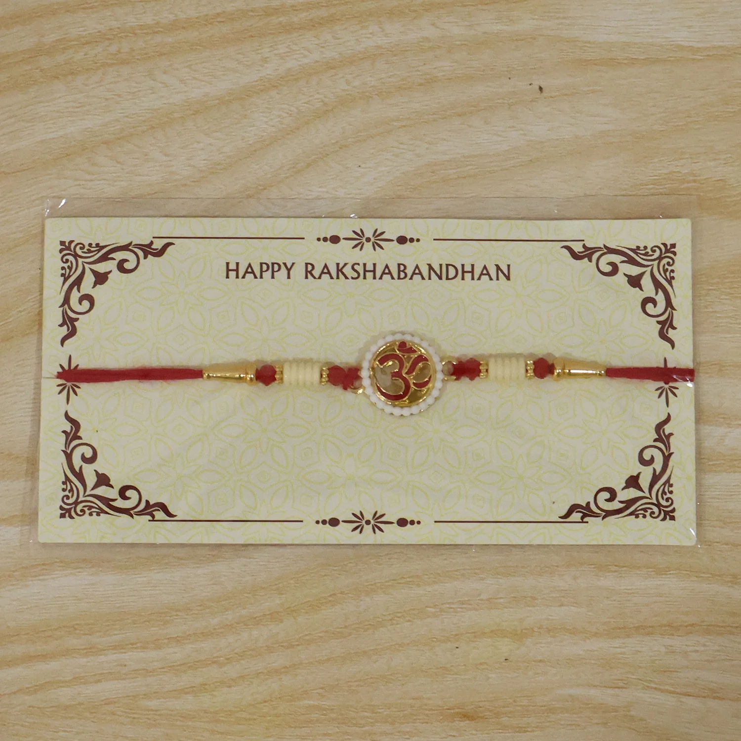 OM Symbol Pearl Frame Designer Rakhi - Image 7